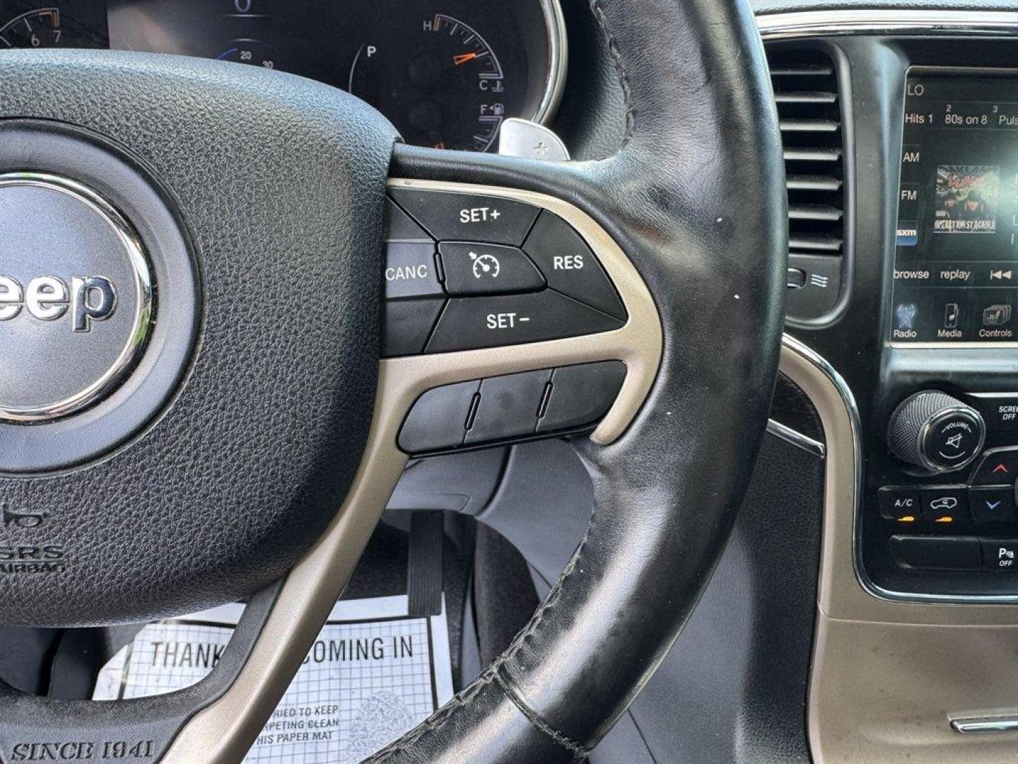 2015 White /Black Jeep Grand Cherokee (1C4RJFBG0FC) with an 3.6l V6 MPI Dohc VVT Flex engine, Automatic transmission, located at 745 East Steele Rd., West Columbia, SC, 29170, (803) 755-9148, 33.927212, -81.148483 - Special Internet Price! 2015 Jeep Grand Cherokee with AM/FM radio, Bluetooth, Backup camera, Navigation, Cruise control, Leather interior, Powered driver seat, 4x4, Push to start, Keyless entry, Powered windows, Powered door locks, Plus more! - Photo#9