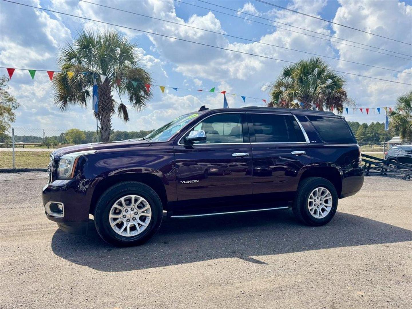2017 Purple /Taupe GMC Yukon (1GKS2BKCXHR) with an 5.3l V8 DI OHV GAS 5.3l engine, Automatic transmission, located at 745 East Steele Rd., West Columbia, SC, 29170, (803) 755-9148, 33.927212, -81.148483 - Special Internet Price! 2017 GMC Yukon! - Photo#0