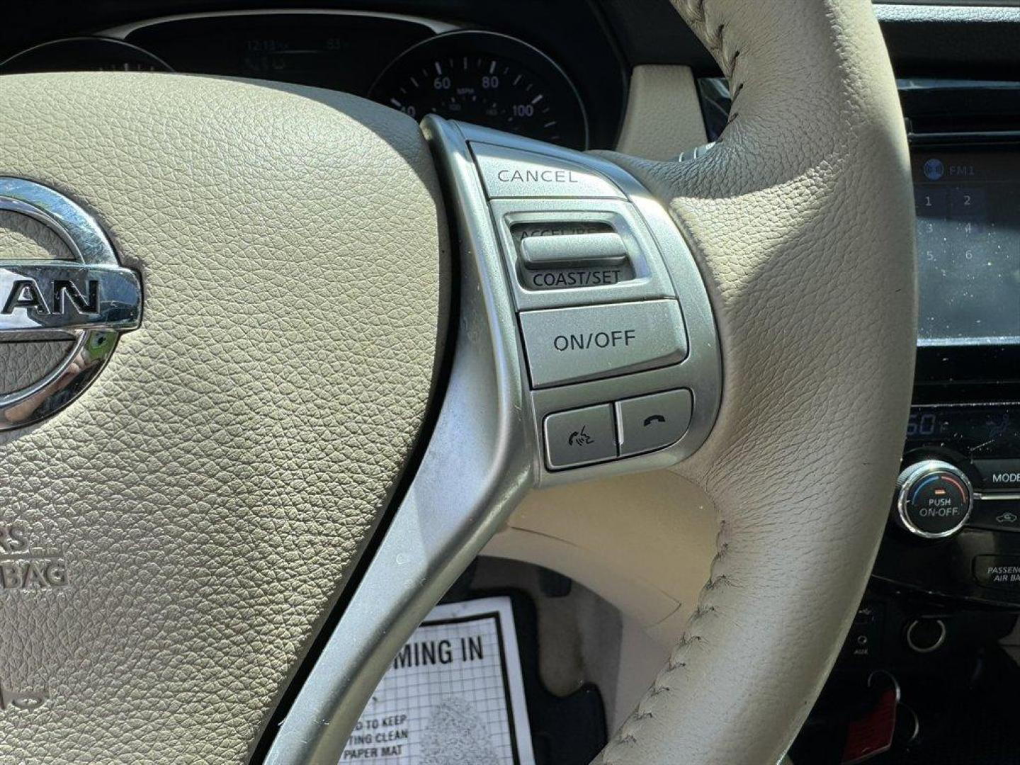 2015 Blue /Grey Nissan Rogue (5N1AT2MT1FC) with an 2.5l I-4 MPI Dohc 2.5l engine, Automatic transmission, located at 745 East Steele Rd., West Columbia, SC, 29170, (803) 755-9148, 33.927212, -81.148483 - Special Internet Price! 2015 Nissan Rogue with AM/FM radio, Backup camera, Navigation, Cruise control, Keyless entry, Push to start, Leather interior, Panoramic sunroof, Powered driver seat, Powered liftgate, Powered windows, Powered door locks, Plus more! - Photo#8