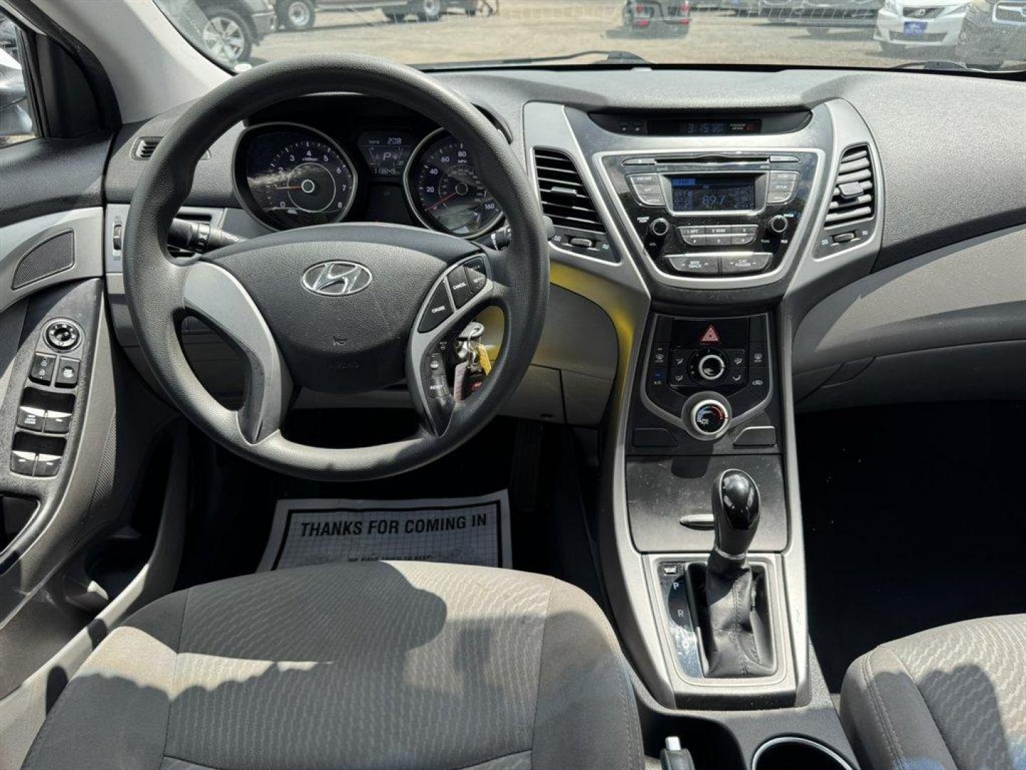 2015 White /Grey Hyundai Elantra (5NPDH4AE6FH) with an 1.8l I-4 MPI Dohc 1.8l engine, Automatic transmission, located at 745 East Steele Rd., West Columbia, SC, 29170, (803) 755-9148, 33.927212, -81.148483 - Special Internet Price! 2015 Hyundai Elantra with AM/FM radio, Keyless entry, Cloth interior, Powered windows, Powered door locks, Plus more! - Photo#6