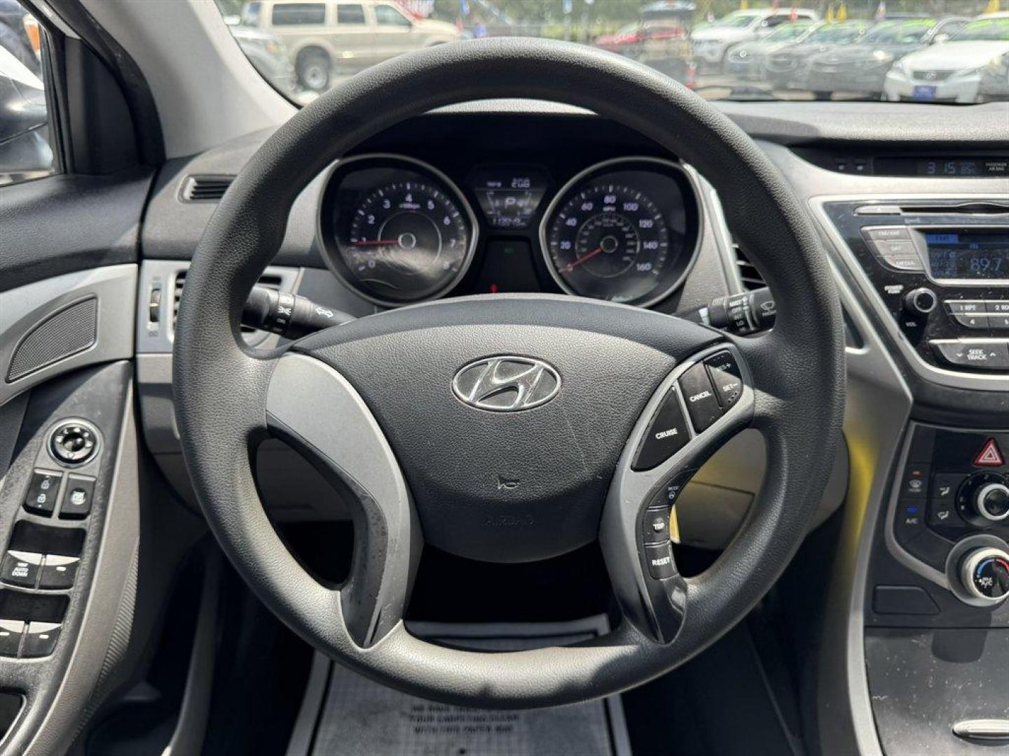 2015 White /Grey Hyundai Elantra (5NPDH4AE6FH) with an 1.8l I-4 MPI Dohc 1.8l engine, Automatic transmission, located at 745 East Steele Rd., West Columbia, SC, 29170, (803) 755-9148, 33.927212, -81.148483 - Special Internet Price! 2015 Hyundai Elantra with AM/FM radio, Keyless entry, Cloth interior, Powered windows, Powered door locks, Plus more! - Photo#7