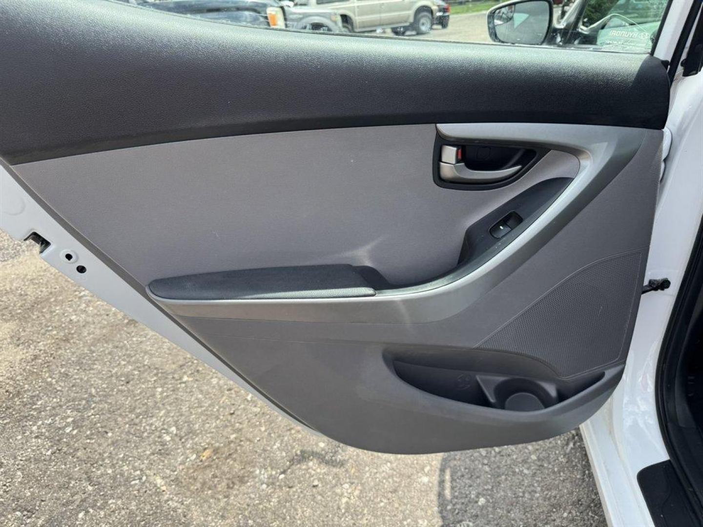 2015 White /Grey Hyundai Elantra (5NPDH4AE6FH) with an 1.8l I-4 MPI Dohc 1.8l engine, Automatic transmission, located at 745 East Steele Rd., West Columbia, SC, 29170, (803) 755-9148, 33.927212, -81.148483 - Special Internet Price! 2015 Hyundai Elantra with AM/FM radio, Keyless entry, Cloth interior, Powered windows, Powered door locks, Plus more! - Photo#20