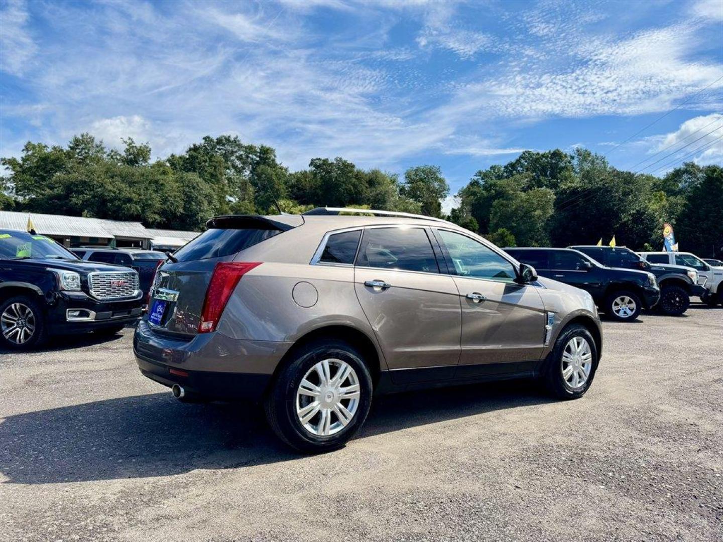 2012 Brown /Taupe Cadillac SRX (3GYFNAE35CS) with an 3.6l V6 Sidi Dohc Flex 3. engine, Automatic transmission, located at 745 East Steele Rd., West Columbia, SC, 29170, (803) 755-9148, 33.927212, -81.148483 - Special Internet Price! 2012 Cadillac SRX with AM/FM radio, Backup camera, Navigation, Panoramic sunroof, Push to start, Keyless entry, Leather interior, Powered driver seat, Powered windows, Powered door locks, Plus more! - Photo#3