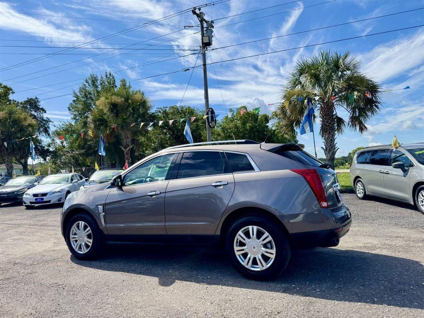 2012 Brown /Taupe Cadillac SRX (3GYFNAE35CS) with an 3.6l V6 Sidi Dohc Flex 3. engine, Automatic transmission, located at 745 East Steele Rd., West Columbia, SC, 29170, (803) 755-9148, 33.927212, -81.148483 - Special Internet Price! 2012 Cadillac SRX with AM/FM radio, Backup camera, Navigation, Panoramic sunroof, Push to start, Keyless entry, Leather interior, Powered driver seat, Powered windows, Powered door locks, Plus more! - Photo#5