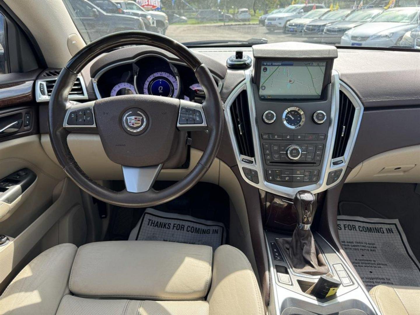 2012 Brown /Taupe Cadillac SRX (3GYFNAE35CS) with an 3.6l V6 Sidi Dohc Flex 3. engine, Automatic transmission, located at 745 East Steele Rd., West Columbia, SC, 29170, (803) 755-9148, 33.927212, -81.148483 - Special Internet Price! 2012 Cadillac SRX with AM/FM radio, Backup camera, Navigation, Panoramic sunroof, Push to start, Keyless entry, Leather interior, Powered driver seat, Powered windows, Powered door locks, Plus more! - Photo#6