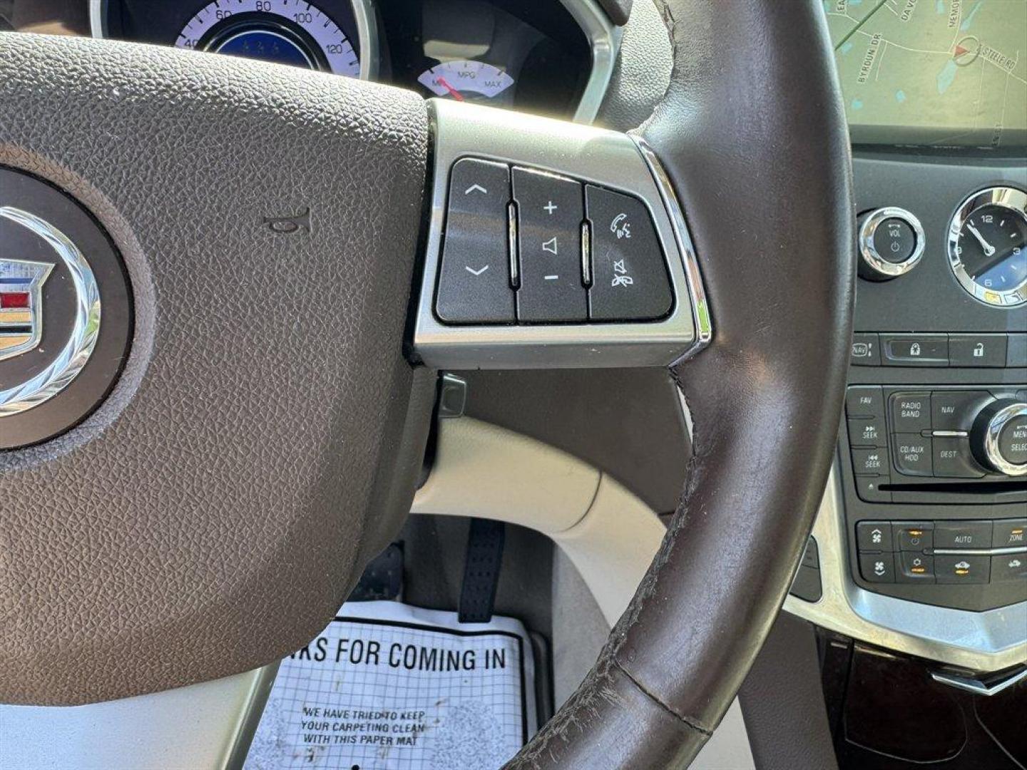 2012 Brown /Taupe Cadillac SRX (3GYFNAE35CS) with an 3.6l V6 Sidi Dohc Flex 3. engine, Automatic transmission, located at 745 East Steele Rd., West Columbia, SC, 29170, (803) 755-9148, 33.927212, -81.148483 - Special Internet Price! 2012 Cadillac SRX with AM/FM radio, Backup camera, Navigation, Panoramic sunroof, Push to start, Keyless entry, Leather interior, Powered driver seat, Powered windows, Powered door locks, Plus more! - Photo#9