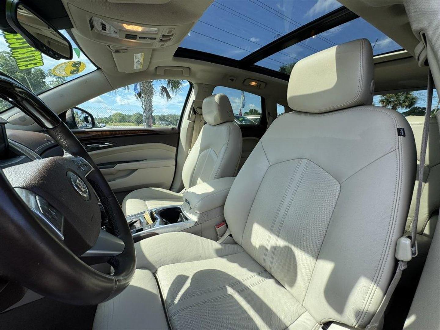 2012 Brown /Taupe Cadillac SRX (3GYFNAE35CS) with an 3.6l V6 Sidi Dohc Flex 3. engine, Automatic transmission, located at 745 East Steele Rd., West Columbia, SC, 29170, (803) 755-9148, 33.927212, -81.148483 - Special Internet Price! 2012 Cadillac SRX with AM/FM radio, Backup camera, Navigation, Panoramic sunroof, Push to start, Keyless entry, Leather interior, Powered driver seat, Powered windows, Powered door locks, Plus more! - Photo#24