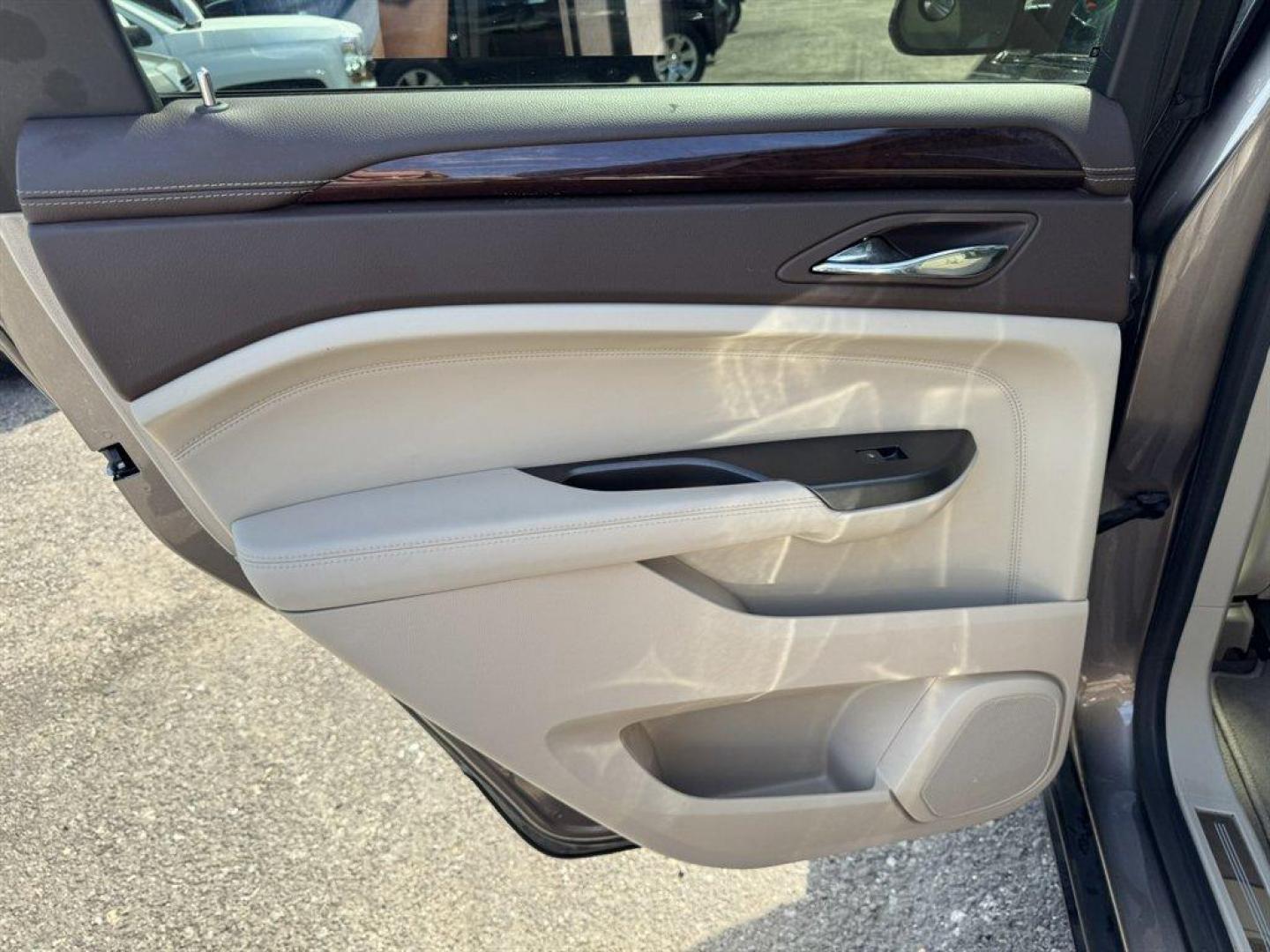 2012 Brown /Taupe Cadillac SRX (3GYFNAE35CS) with an 3.6l V6 Sidi Dohc Flex 3. engine, Automatic transmission, located at 745 East Steele Rd., West Columbia, SC, 29170, (803) 755-9148, 33.927212, -81.148483 - Special Internet Price! 2012 Cadillac SRX with AM/FM radio, Backup camera, Navigation, Panoramic sunroof, Push to start, Keyless entry, Leather interior, Powered driver seat, Powered windows, Powered door locks, Plus more! - Photo#26