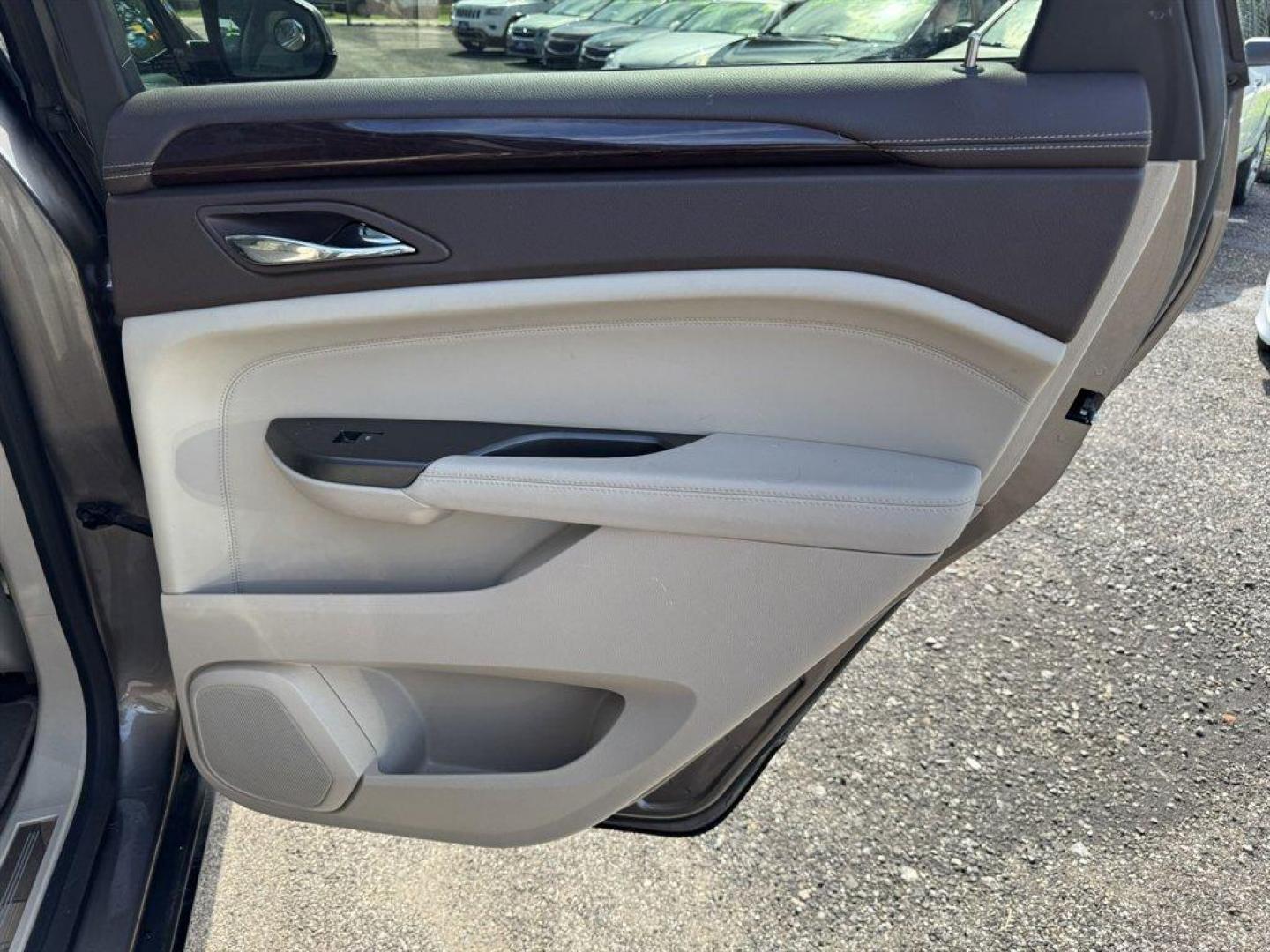 2012 Brown /Taupe Cadillac SRX (3GYFNAE35CS) with an 3.6l V6 Sidi Dohc Flex 3. engine, Automatic transmission, located at 745 East Steele Rd., West Columbia, SC, 29170, (803) 755-9148, 33.927212, -81.148483 - Special Internet Price! 2012 Cadillac SRX with AM/FM radio, Backup camera, Navigation, Panoramic sunroof, Push to start, Keyless entry, Leather interior, Powered driver seat, Powered windows, Powered door locks, Plus more! - Photo#28