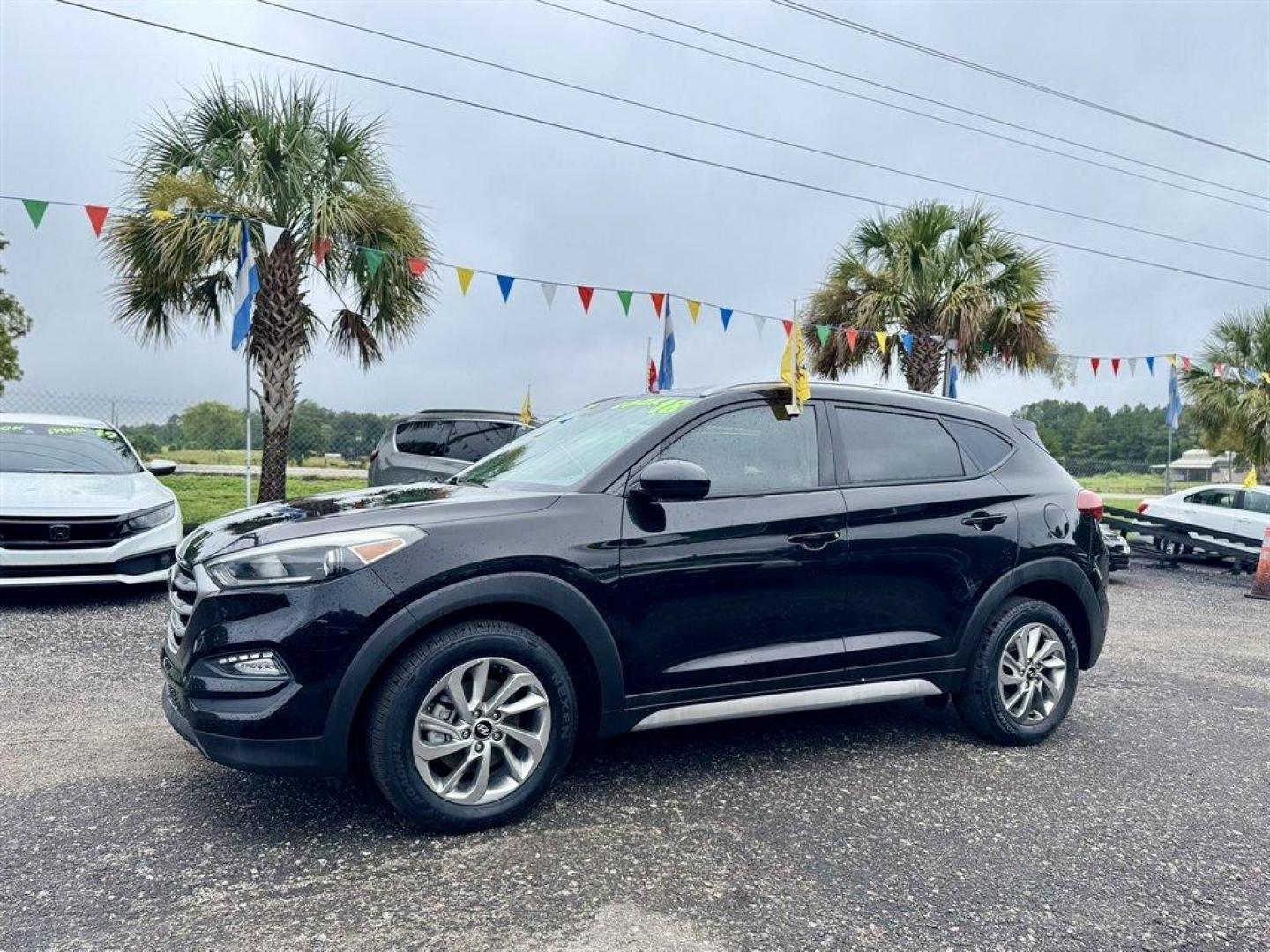 2018 Black /Grey Hyundai Tucson (KM8J33A41JU) with an 2.0l I-4 DI Dohc Cvvt 2.0 engine, Automatic transmission, located at 745 East Steele Rd., West Columbia, SC, 29170, (803) 755-9148, 33.927212, -81.148483 - Special Internet Price! 2018 Hyundai Tucson with AM/FM radio, Bluetooth, Backup camera, Cruise control, Keyless entry, Cloth interior, Powered windows, Powered door locks, Plus more! - Photo#0