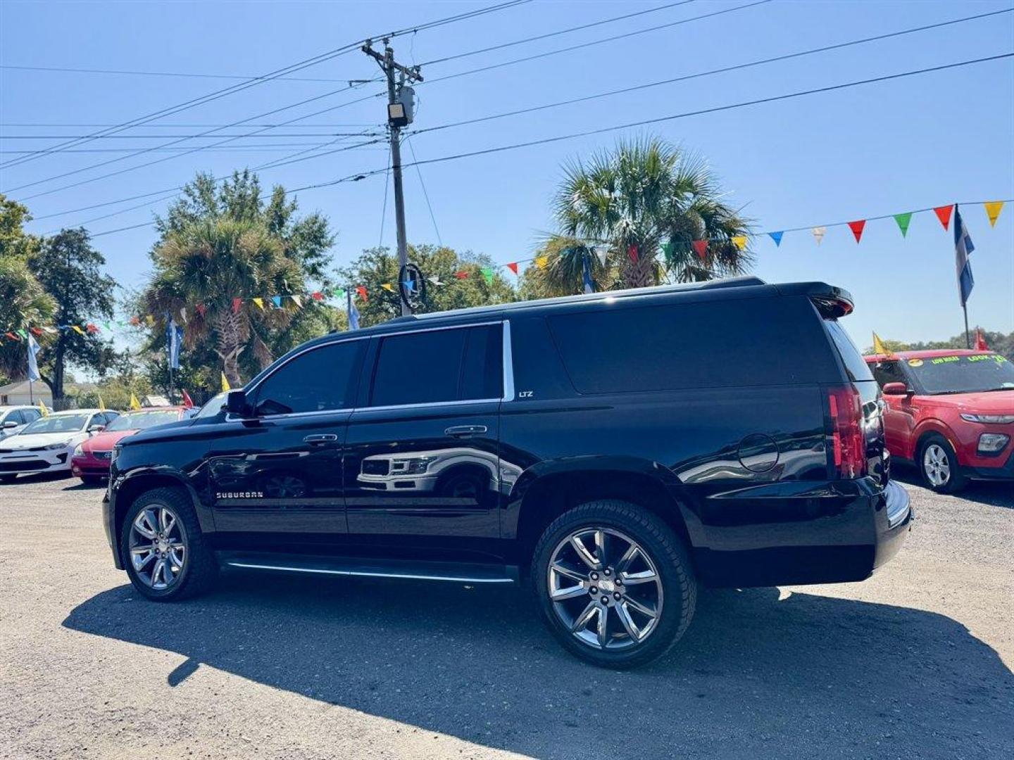 2015 Black /Black Chevrolet Suburban (1GNSCKKC0FR) with an 5.3l V8 DI VVT Flex 5.3l engine, Automatic transmission, located at 745 East Steele Rd., West Columbia, SC, 29170, (803) 755-9148, 33.927212, -81.148483 - Special Internet Price! 2015 Chevrolet Suburban - Photo#5
