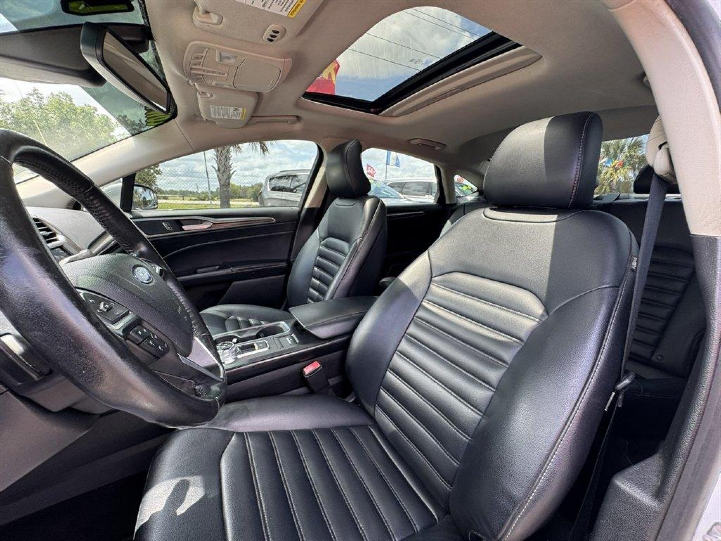 2019 White /Black Ford Fusion (3FA6P0CD8KR) with an 1.5l I-4 DI Dohc Ecoboost engine, Automatic transmission, located at 745 East Steele Rd., West Columbia, SC, 29170, (803) 755-9148, 33.927212, -81.148483 - Special Internet Price! 2019 Ford Fusion with AM/FM radio, Backup camera, Cruise control, Keyless entry, Leather interior, Powered driver seat, Powered windows, Powered door locks, Plus more! - Photo#23