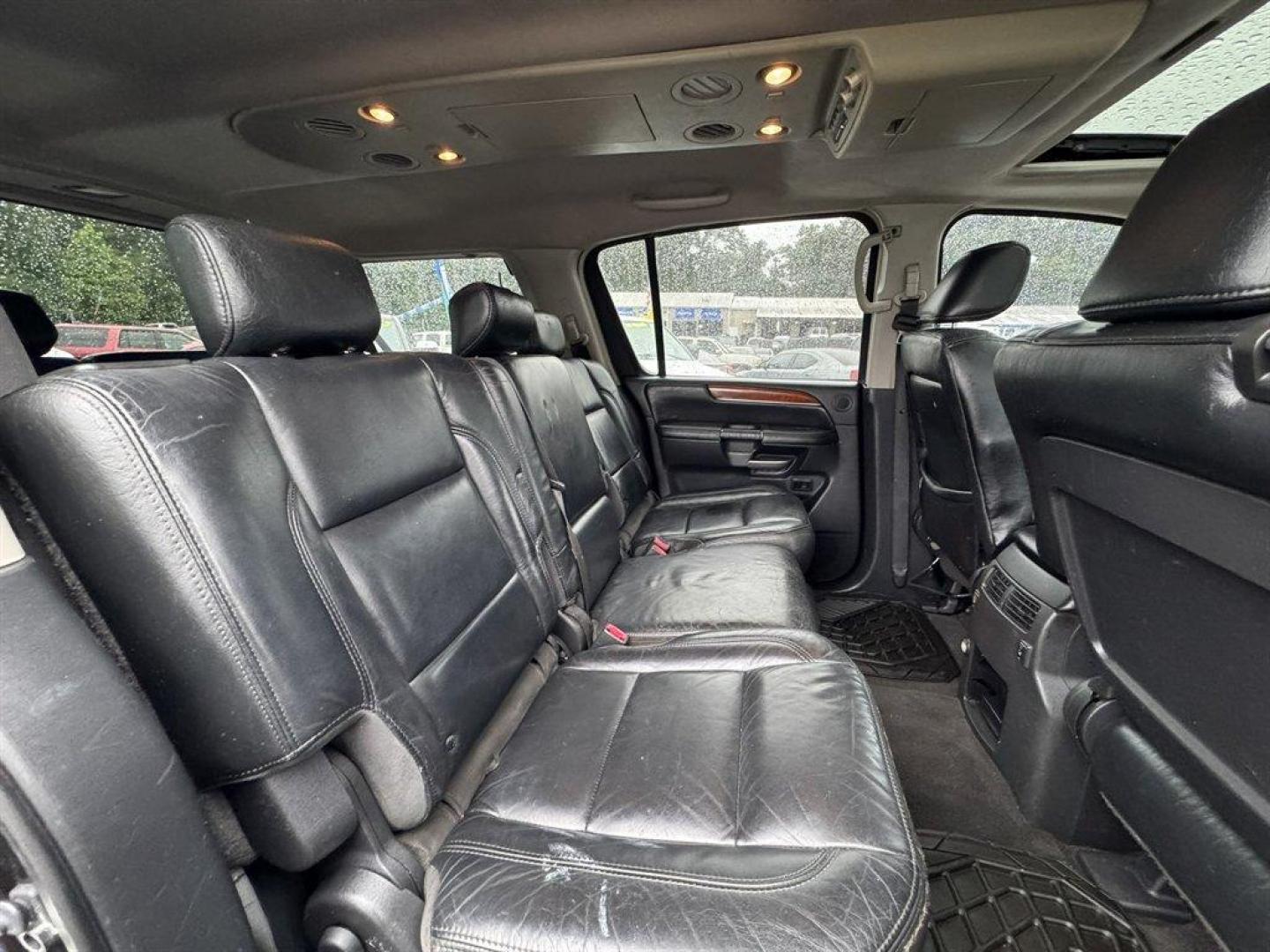 2009 Black /Black Infiniti QX56 (5N3AA08D89N) with an 5.6l V8 MPI Dohc 5.6l engine, Automatic transmission, located at 745 East Steele Rd., West Columbia, SC, 29170, (803) 755-9148, 33.927212, -81.148483 - Special Internet Price! 2009 Infiniti QX56 with AM/FM radio, Backup camera, Navigation, Cruise control, Sunroof, Leather interior, 3rd row seating, Heated seats, Keyless entry, Powered liftgate, Powered windows, Powered door locks, Plus more! - Photo#29