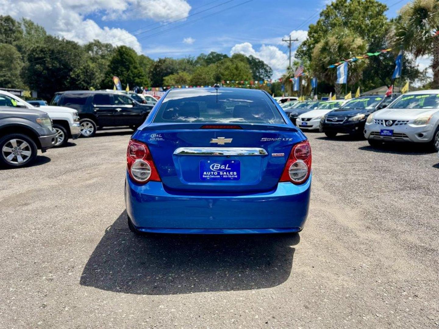 2016 Blue /Black Chevrolet Sonic (1G1JE5SB0G4) with an 1.4l I-4 MFI Dohc T/C 1.4 engine, Automatic transmission, located at 745 East Steele Rd., West Columbia, SC, 29170, (803) 755-9148, 33.927212, -81.148483 - Special Internet Price! 2016 Chevrolet Sonic with AM/FM radio, Backup camera, Cruise control, Leather interior, Powered windows, Powered door locks, Plus more! - Photo#4