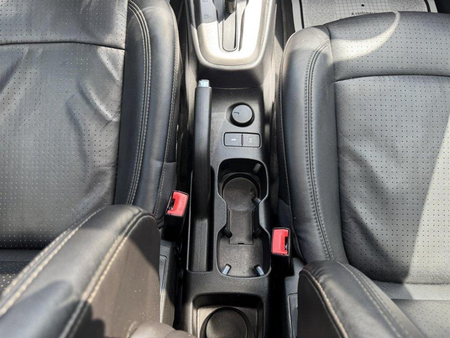 2016 Blue /Black Chevrolet Sonic (1G1JE5SB0G4) with an 1.4l I-4 MFI Dohc T/C 1.4 engine, Automatic transmission, located at 745 East Steele Rd., West Columbia, SC, 29170, (803) 755-9148, 33.927212, -81.148483 - Special Internet Price! 2016 Chevrolet Sonic with AM/FM radio, Backup camera, Cruise control, Leather interior, Powered windows, Powered door locks, Plus more! - Photo#14