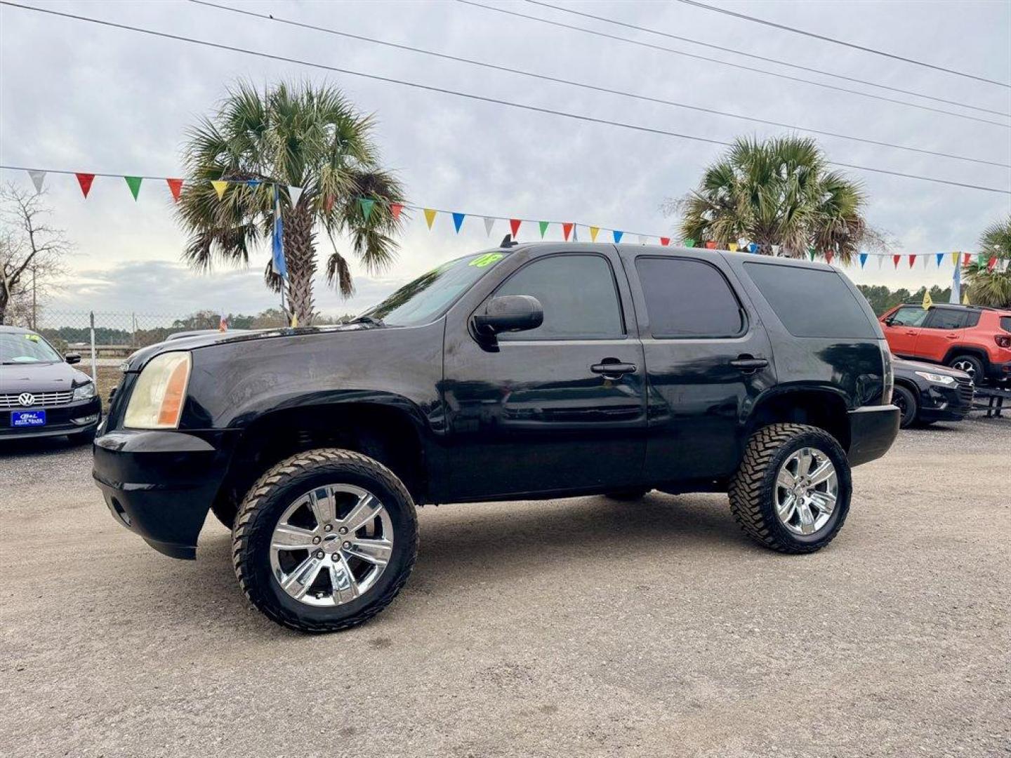 2008 Black /Black GMC Yukon (1GKEC63828J) with an 6.2l V8 SFI OHV HO 6.2l engine, Automatic transmission, located at 745 East Steele Rd., West Columbia, SC, 29170, (803) 755-9148, 33.927212, -81.148483 - Photo#0