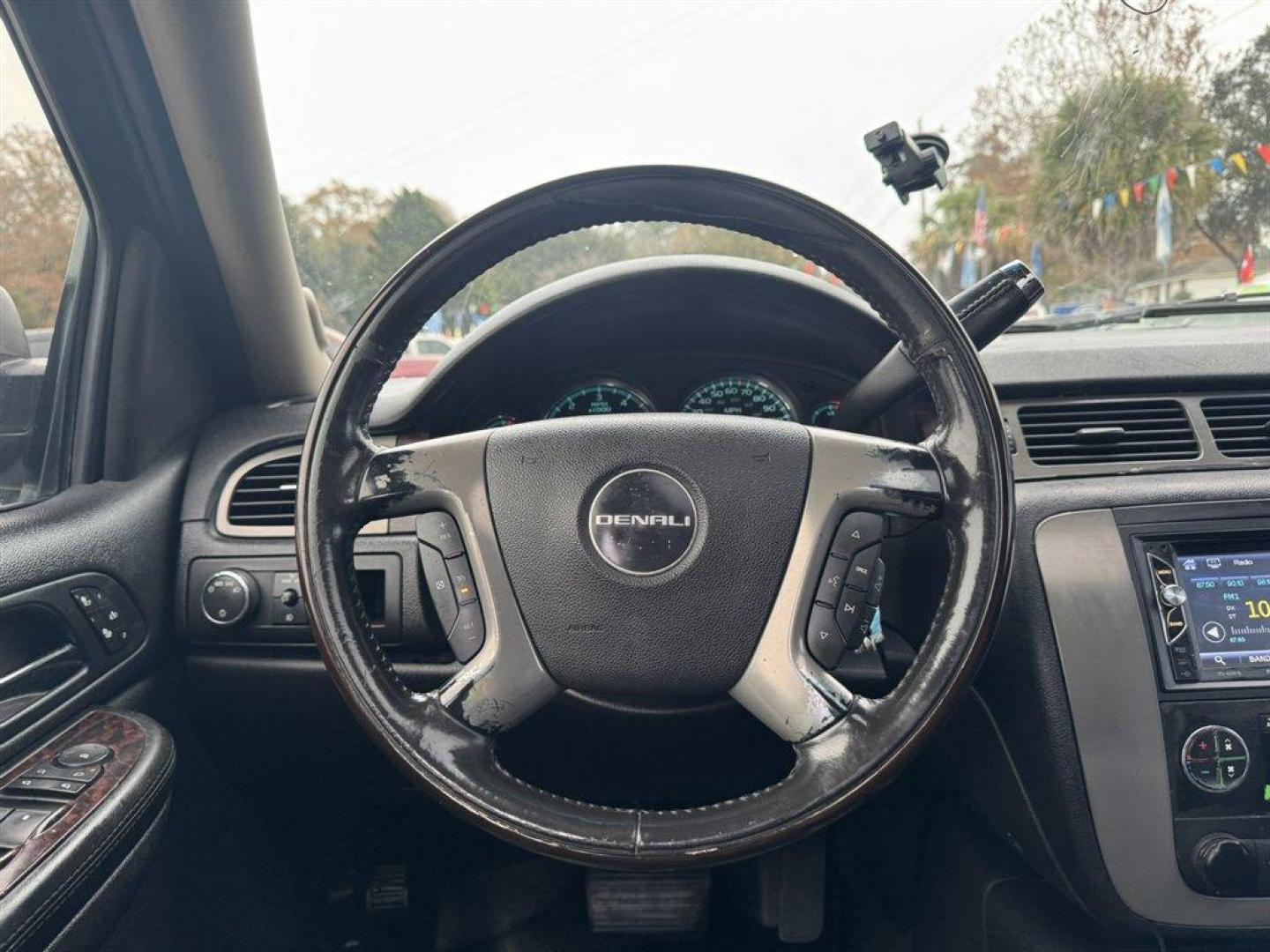 2008 Black /Black GMC Yukon (1GKEC63828J) with an 6.2l V8 SFI OHV HO 6.2l engine, Automatic transmission, located at 745 East Steele Rd., West Columbia, SC, 29170, (803) 755-9148, 33.927212, -81.148483 - Photo#7
