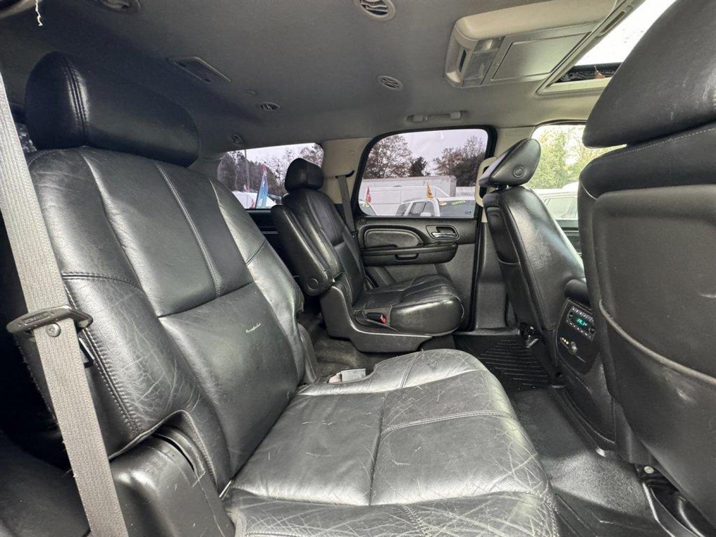 2008 Black /Black GMC Yukon (1GKEC63828J) with an 6.2l V8 SFI OHV HO 6.2l engine, Automatic transmission, located at 745 East Steele Rd., West Columbia, SC, 29170, (803) 755-9148, 33.927212, -81.148483 - Photo#25