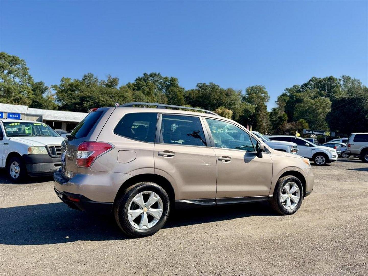 2015 Brown /Bronze Subaru Forester (JF2SJADC3FH) with an 2.5l H-4 MPI Dohc 2.5l engine, Automatic transmission, located at 745 East Steele Rd., West Columbia, SC, 29170, (803) 755-9148, 33.927212, -81.148483 - Special Internet Price! 2015 Subaru Forester - Photo#3