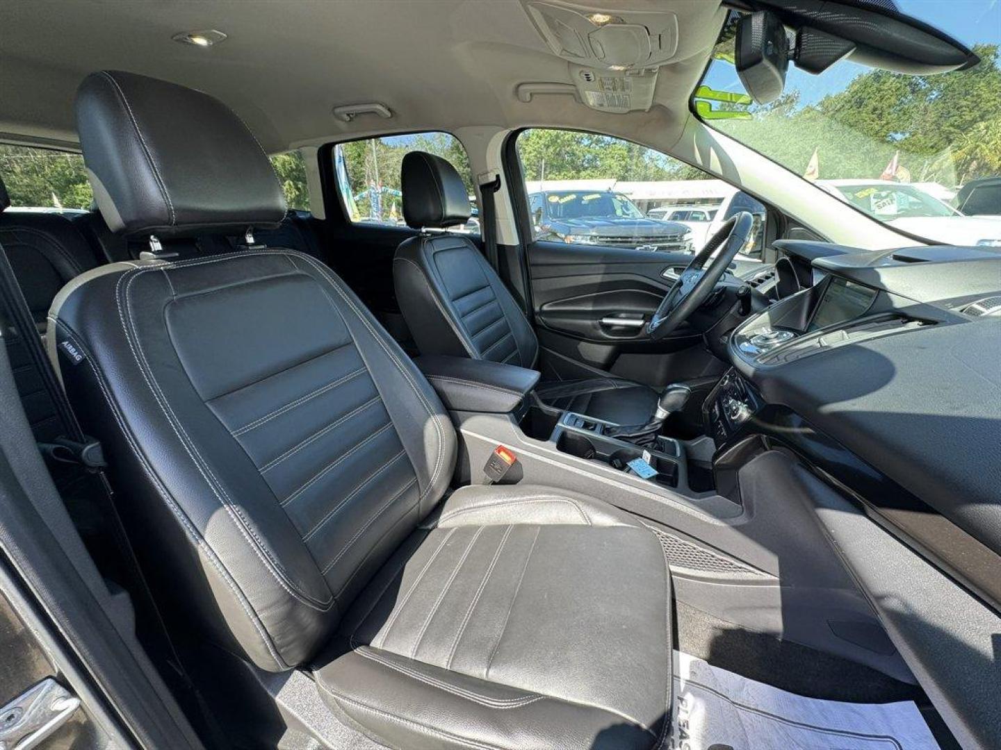 2017 Grey /Black Ford Escape (1FMCU9J99HU) with an 2.0l I-4 DI T/C Ecoboost engine, Automatic transmission, located at 745 East Steele Rd., West Columbia, SC, 29170, (803) 755-9148, 33.927212, -81.148483 - Special Internet Price! 2017 Ford Escape - Photo#25