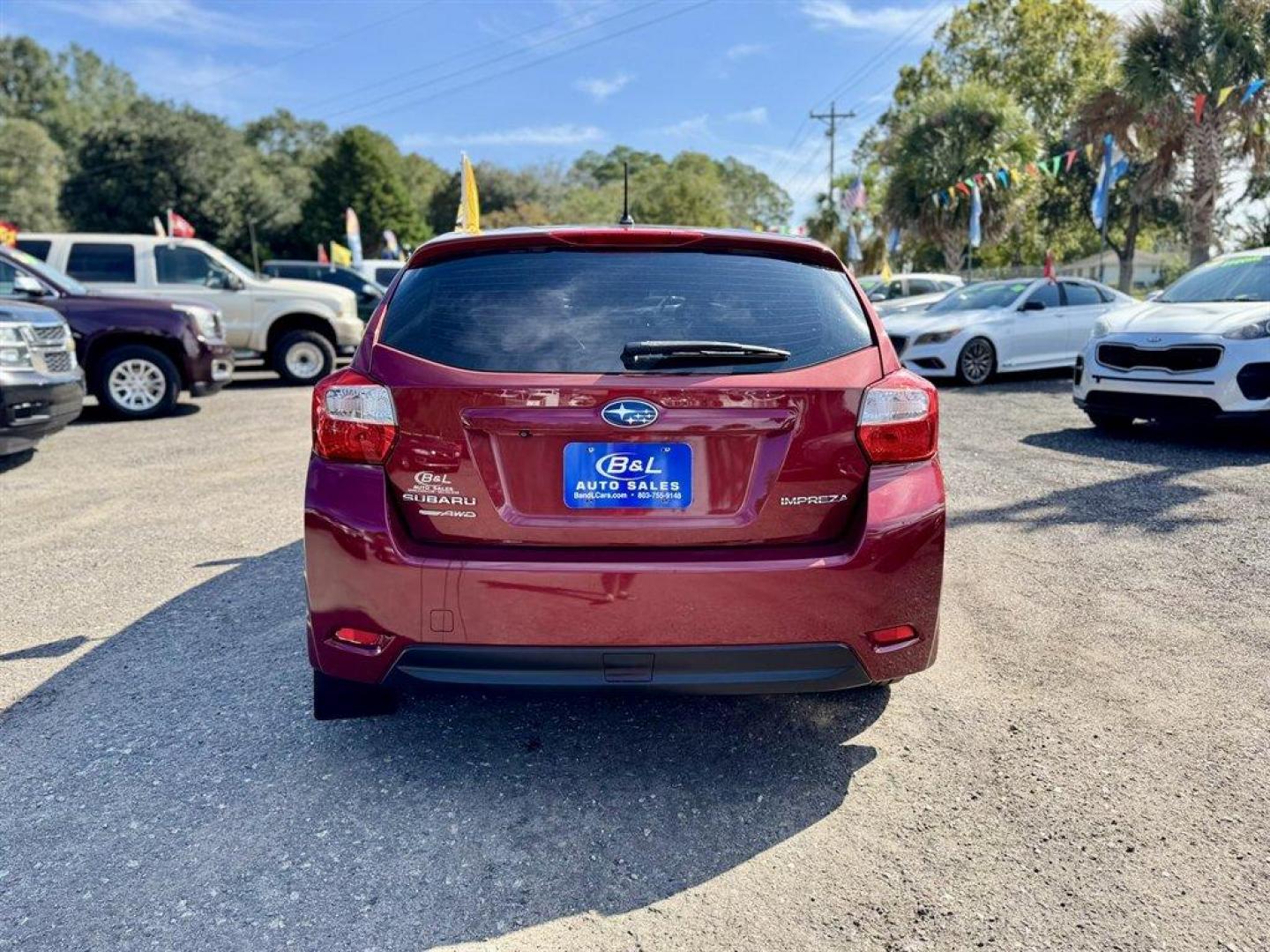 2016 Red /Black Subaru Impreza (JF1GPAB60G8) with an 2.0l H-4 Smpi Dohc 2.0l engine, Automatic transmission, located at 745 East Steele Rd., West Columbia, SC, 29170, (803) 755-9148, 33.927212, -81.148483 - Special Internet Price! 2016 Subaru Impreza - Photo#4