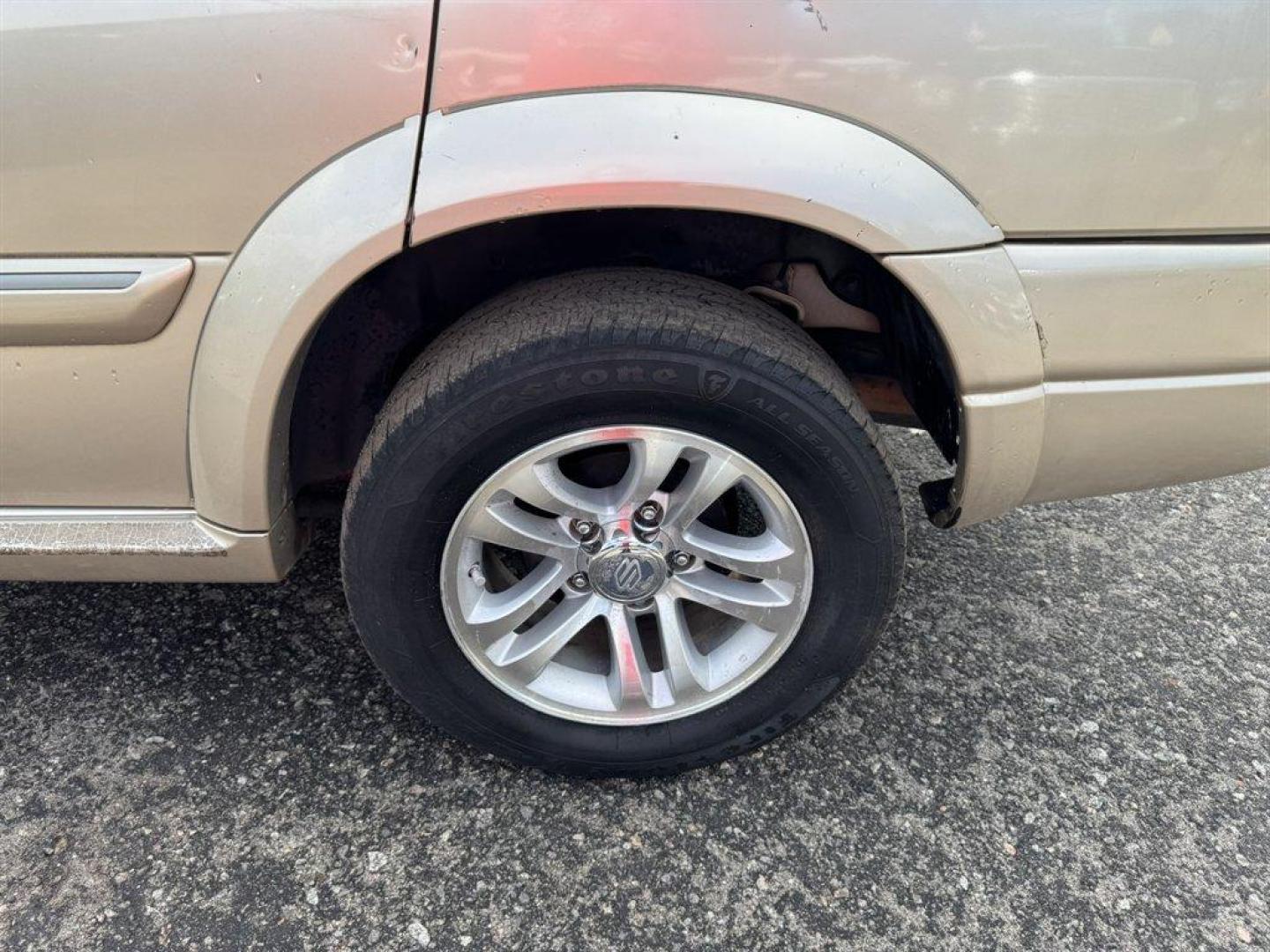 2006 Bronze /Tan Suzuki XL-7 (JS3TY92V364) with an 2.7l V6 MPI 2.7l engine, Automatic transmission, located at 745 East Steele Rd., West Columbia, SC, 29170, (803) 755-9148, 33.927212, -81.148483 - Special Internet Price! 2006 Suzuki XL-7 - Photo#29