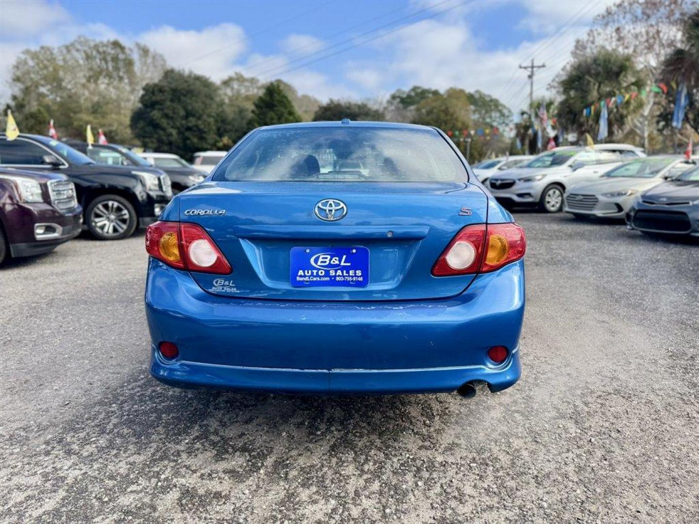 2009 Blue /Black Toyota Corolla (1NXBU40E29Z) with an 1.8l I-4 EFI Dohc 1.8l engine, Automatic transmission, located at 745 East Steele Rd., West Columbia, SC, 29170, (803) 755-9148, 33.927212, -81.148483 - Photo#4