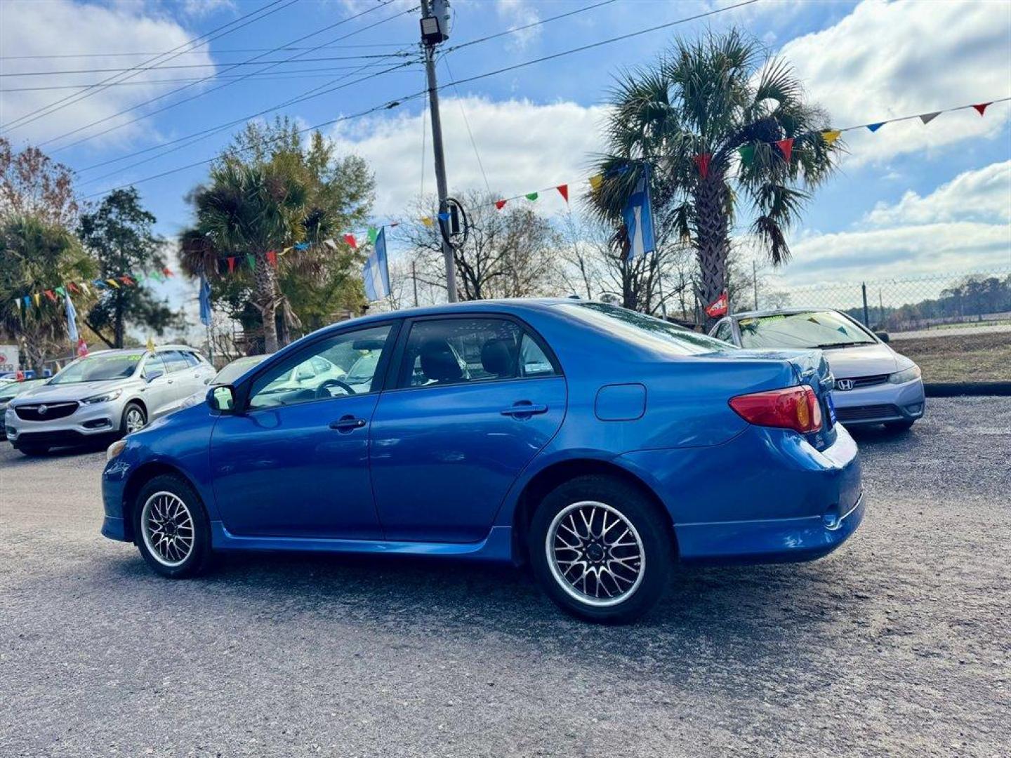 2009 Blue /Black Toyota Corolla (1NXBU40E29Z) with an 1.8l I-4 EFI Dohc 1.8l engine, Automatic transmission, located at 745 East Steele Rd., West Columbia, SC, 29170, (803) 755-9148, 33.927212, -81.148483 - Photo#5