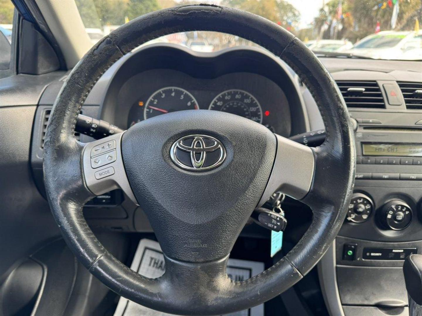 2009 Blue /Black Toyota Corolla (1NXBU40E29Z) with an 1.8l I-4 EFI Dohc 1.8l engine, Automatic transmission, located at 745 East Steele Rd., West Columbia, SC, 29170, (803) 755-9148, 33.927212, -81.148483 - Photo#7
