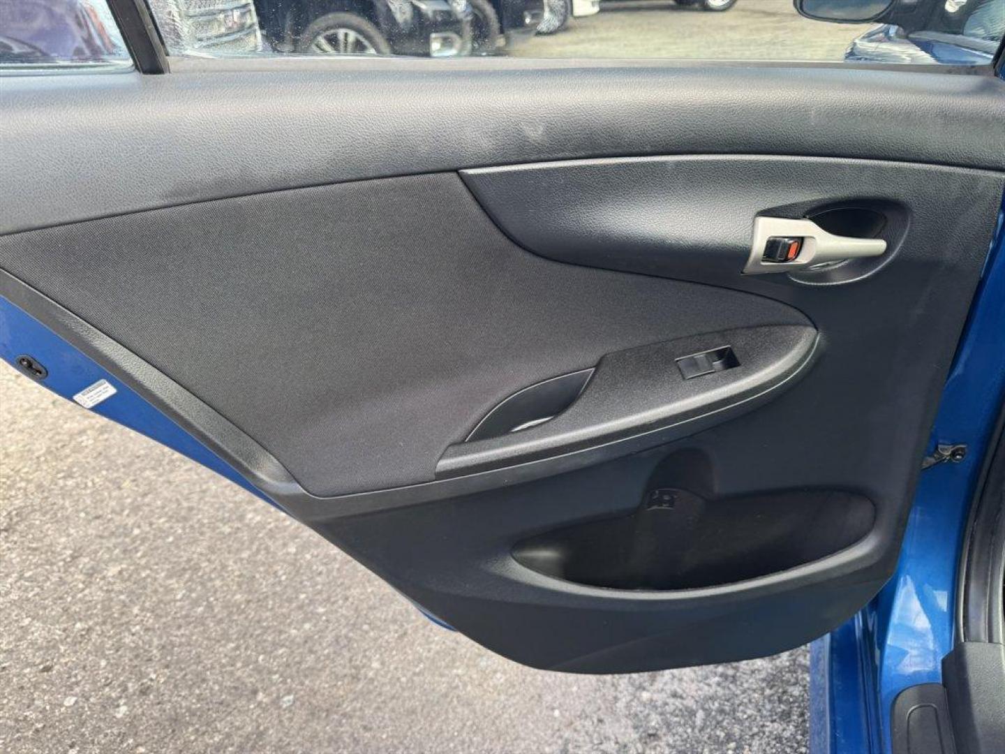 2009 Blue /Black Toyota Corolla (1NXBU40E29Z) with an 1.8l I-4 EFI Dohc 1.8l engine, Automatic transmission, located at 745 East Steele Rd., West Columbia, SC, 29170, (803) 755-9148, 33.927212, -81.148483 - Photo#14