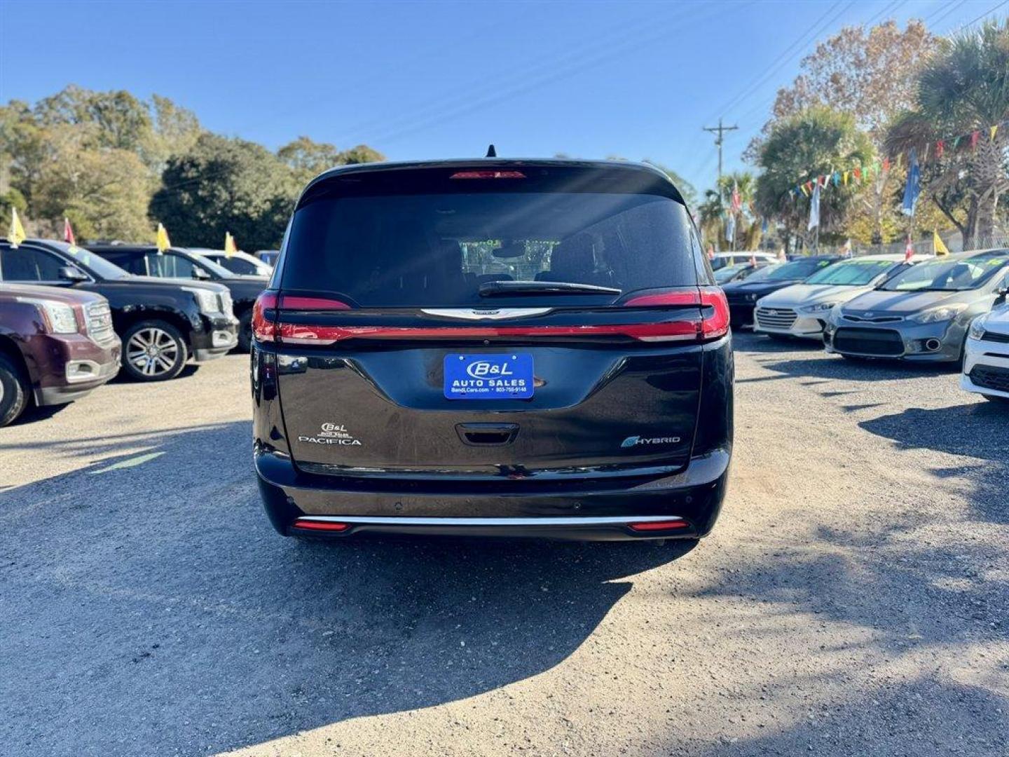 2023 Black /Black Chrysler Pacifica (2C4RC1L79PR) with an 3.6l V6 Smpi Dohc Phev 3. engine, Automatic transmission, located at 745 East Steele Rd., West Columbia, SC, 29170, (803) 755-9148, 33.927212, -81.148483 - Special Internet Price! 2023 Chrysler Pacifica - Photo#4