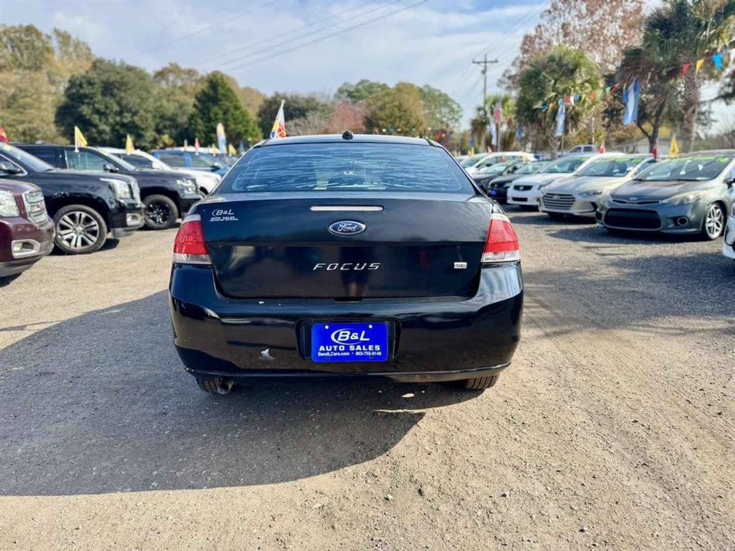 2010 Black /Grey Ford Focus (1FAHP3FN4AW) with an 2.0l I-4 SFI Dohc 2.0l engine, Automatic transmission, located at 745 East Steele Rd., West Columbia, SC, 29170, (803) 755-9148, 33.927212, -81.148483 - Special Internet Price! 2010 Ford Focus - Photo#4