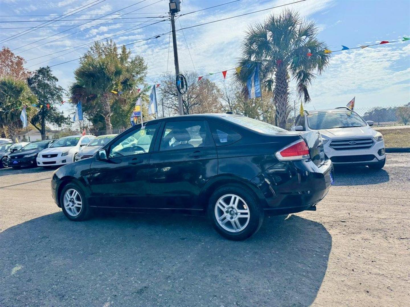 2010 Black /Grey Ford Focus (1FAHP3FN4AW) with an 2.0l I-4 SFI Dohc 2.0l engine, Automatic transmission, located at 745 East Steele Rd., West Columbia, SC, 29170, (803) 755-9148, 33.927212, -81.148483 - Special Internet Price! 2010 Ford Focus - Photo#5