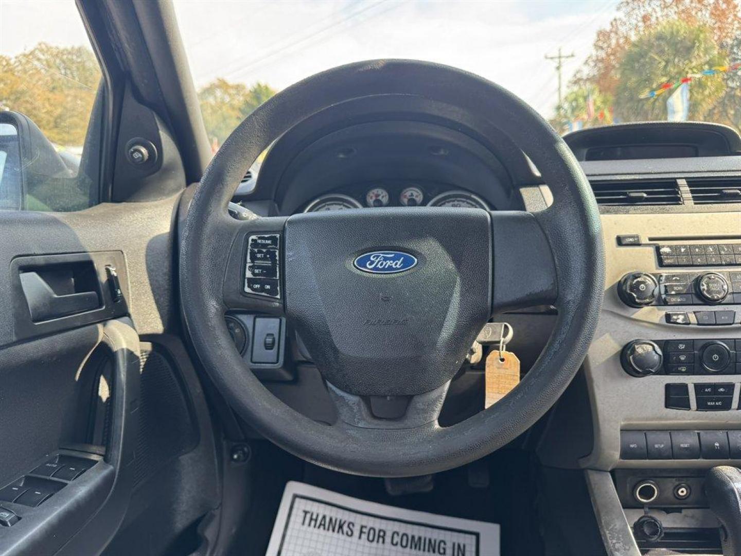 2010 Black /Grey Ford Focus (1FAHP3FN4AW) with an 2.0l I-4 SFI Dohc 2.0l engine, Automatic transmission, located at 745 East Steele Rd., West Columbia, SC, 29170, (803) 755-9148, 33.927212, -81.148483 - Special Internet Price! 2010 Ford Focus - Photo#7