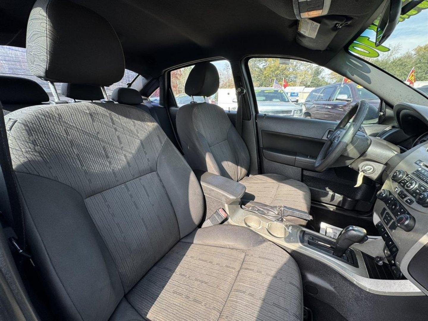 2010 Black /Grey Ford Focus (1FAHP3FN4AW) with an 2.0l I-4 SFI Dohc 2.0l engine, Automatic transmission, located at 745 East Steele Rd., West Columbia, SC, 29170, (803) 755-9148, 33.927212, -81.148483 - Special Internet Price! 2010 Ford Focus - Photo#20