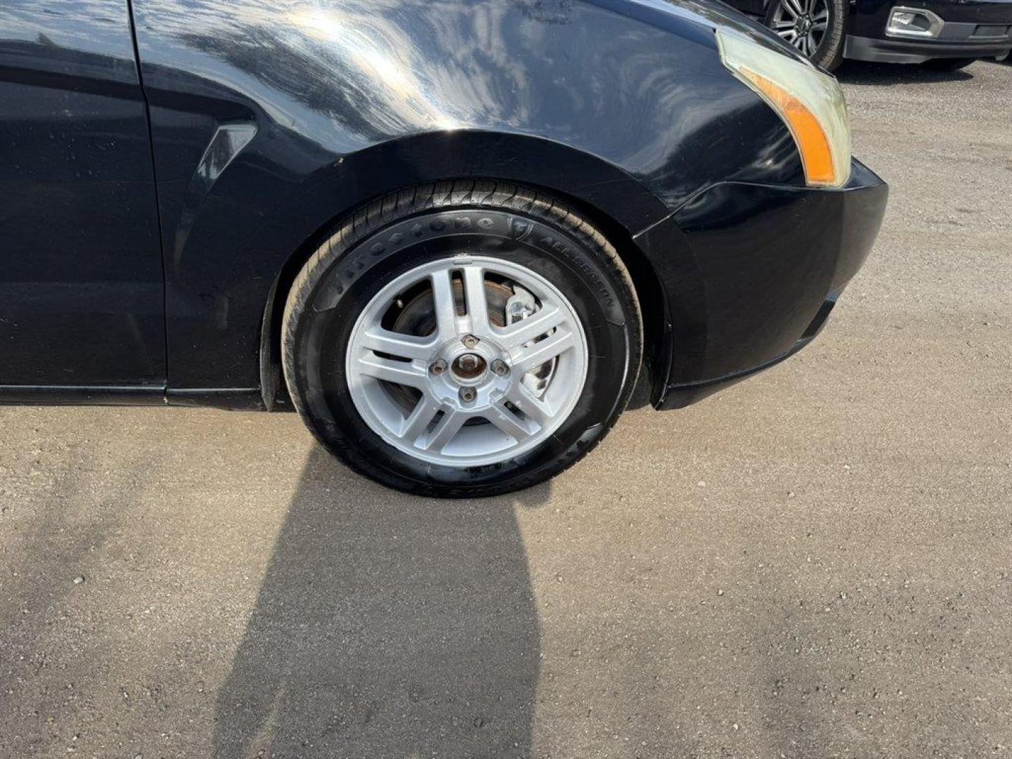 2010 Black /Grey Ford Focus (1FAHP3FN4AW) with an 2.0l I-4 SFI Dohc 2.0l engine, Automatic transmission, located at 745 East Steele Rd., West Columbia, SC, 29170, (803) 755-9148, 33.927212, -81.148483 - Special Internet Price! 2010 Ford Focus - Photo#22