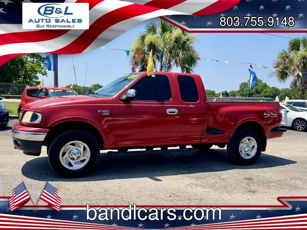 2001 Red /Grey Ford F150 (2FTRX08L21C) with an 5.4l V8 EFI Sohc 5.4l engine, Automatic transmission, located at 745 East Steele Rd., West Columbia, SC, 29170, (803) 755-9148, 33.927212, -81.148483- Photo#0