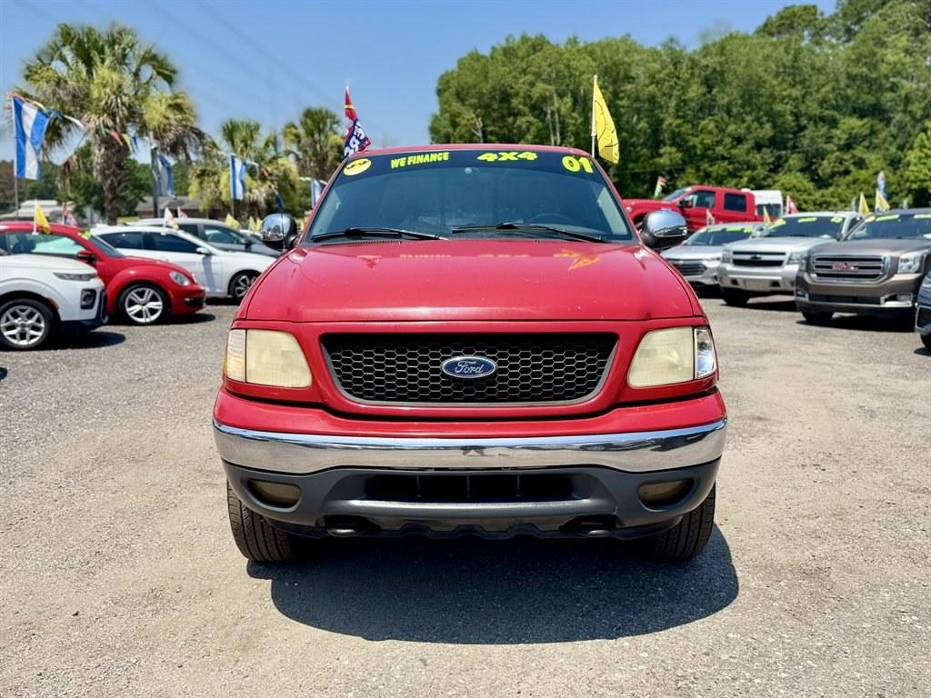2001 Red /Grey Ford F150 (2FTRX08L21C) with an 5.4l V8 EFI Sohc 5.4l engine, Automatic transmission, located at 745 East Steele Rd., West Columbia, SC, 29170, (803) 755-9148, 33.927212, -81.148483- Photo#1