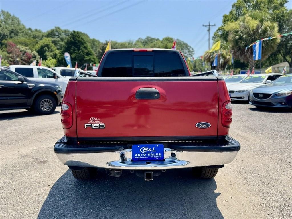 2001 Red /Grey Ford F150 (2FTRX08L21C) with an 5.4l V8 EFI Sohc 5.4l engine, Automatic transmission, located at 745 East Steele Rd., West Columbia, SC, 29170, (803) 755-9148, 33.927212, -81.148483- Photo#4