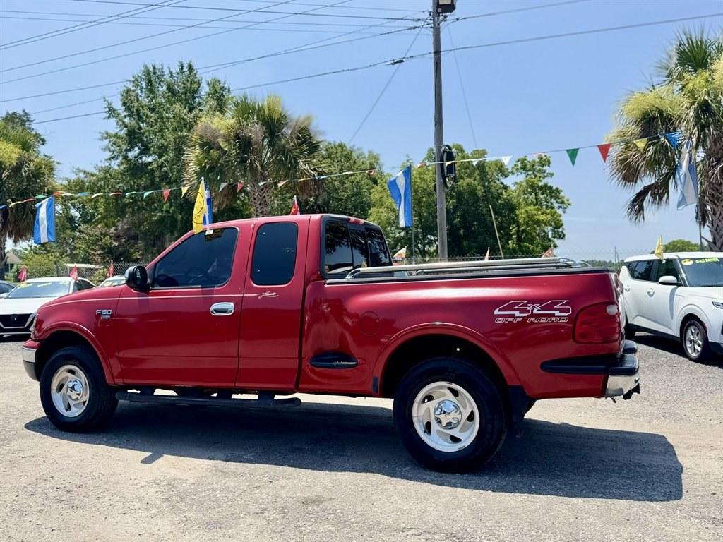 2001 Red /Grey Ford F150 (2FTRX08L21C) with an 5.4l V8 EFI Sohc 5.4l engine, Automatic transmission, located at 745 East Steele Rd., West Columbia, SC, 29170, (803) 755-9148, 33.927212, -81.148483- Photo#5