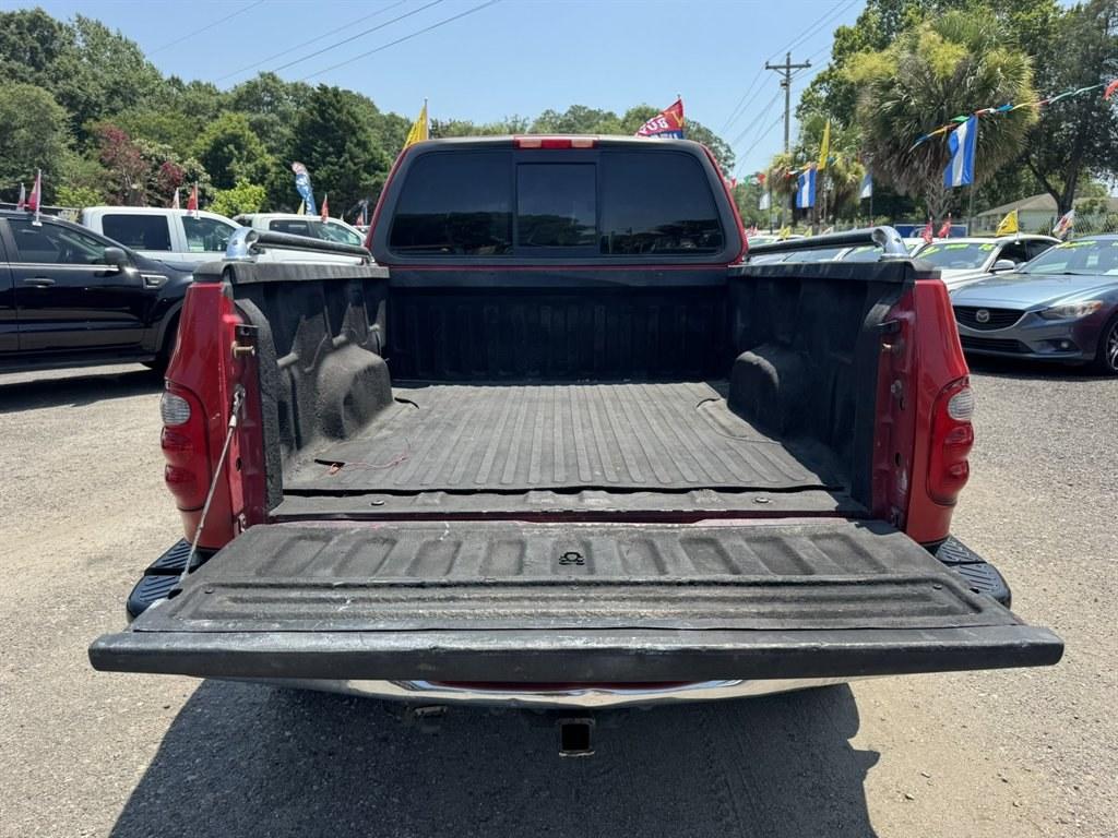 2001 Red /Grey Ford F150 (2FTRX08L21C) with an 5.4l V8 EFI Sohc 5.4l engine, Automatic transmission, located at 745 East Steele Rd., West Columbia, SC, 29170, (803) 755-9148, 33.927212, -81.148483- Photo#23