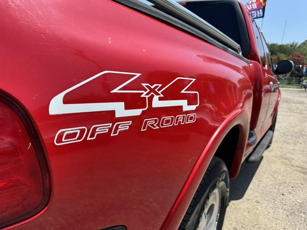 2001 Red /Grey Ford F150 (2FTRX08L21C) with an 5.4l V8 EFI Sohc 5.4l engine, Automatic transmission, located at 745 East Steele Rd., West Columbia, SC, 29170, (803) 755-9148, 33.927212, -81.148483- Photo#24