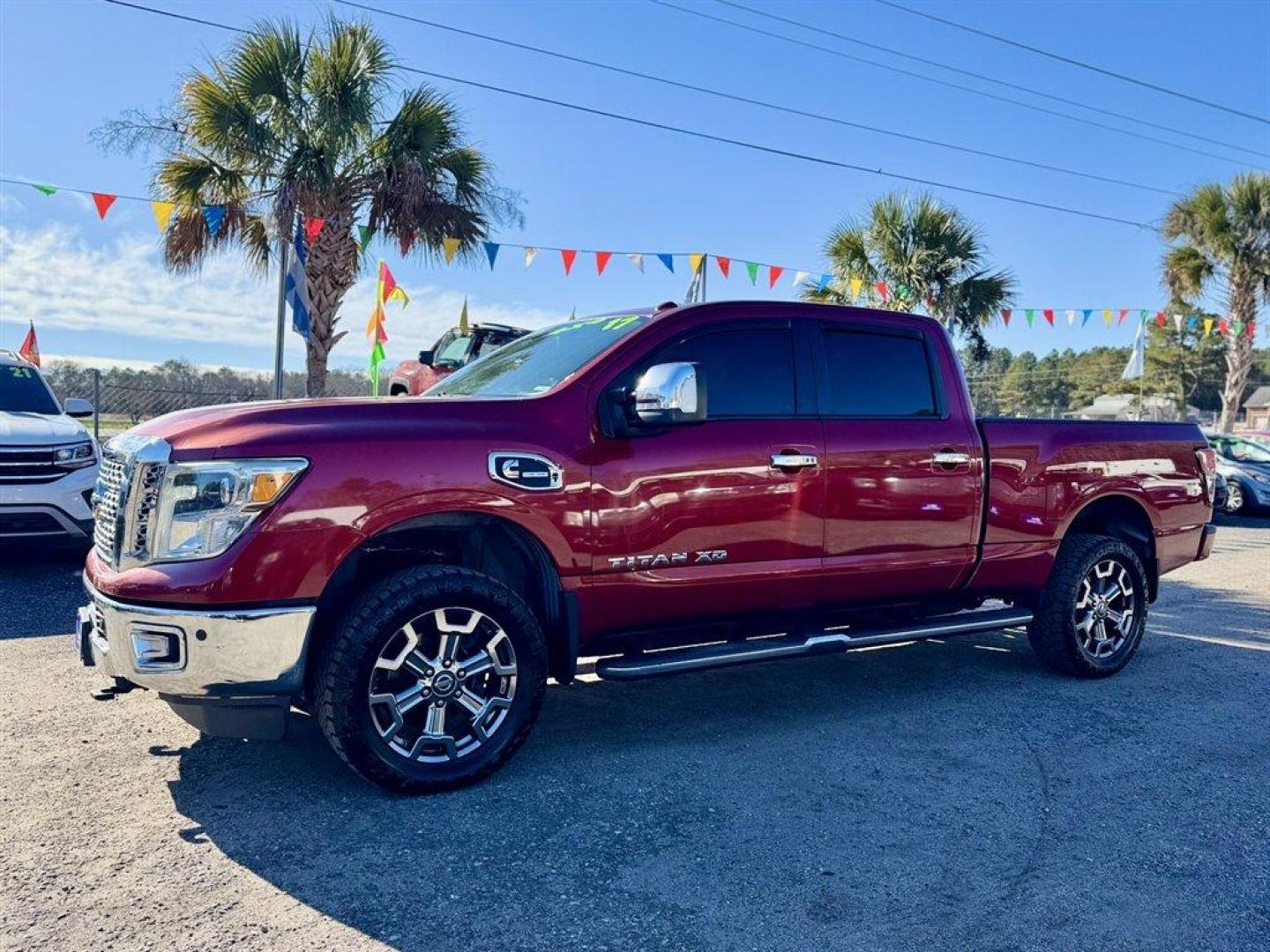2017 Red /Beige Nissan Titan XD (1N6BA1F40HN) with an 5.0l V8 DI Dohc Tdsl 5.0l engine, Automatic transmission, located at 745 East Steele Rd., West Columbia, SC, 29170, (803) 755-9148, 33.927212, -81.148483 - Photo#0