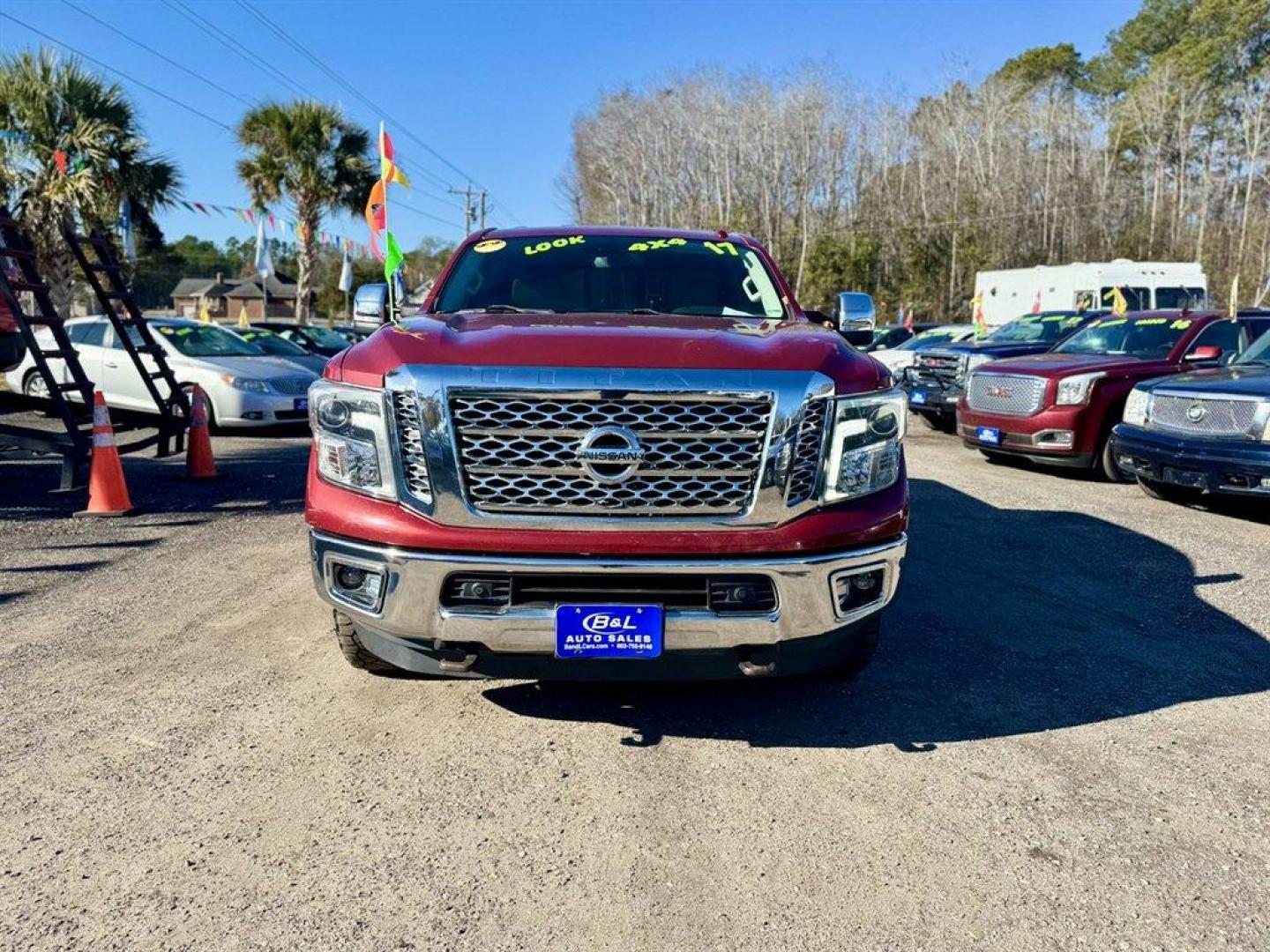 2017 Red /Beige Nissan Titan XD (1N6BA1F40HN) with an 5.0l V8 DI Dohc Tdsl 5.0l engine, Automatic transmission, located at 745 East Steele Rd., West Columbia, SC, 29170, (803) 755-9148, 33.927212, -81.148483 - Photo#1