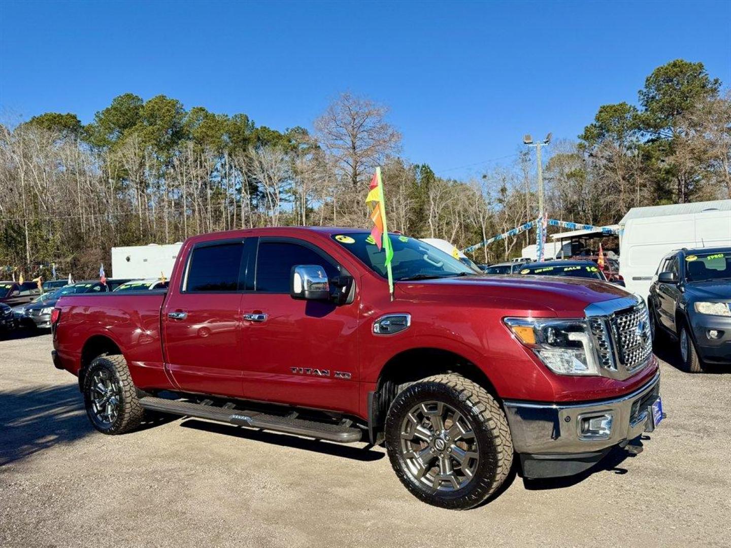 2017 Red /Beige Nissan Titan XD (1N6BA1F40HN) with an 5.0l V8 DI Dohc Tdsl 5.0l engine, Automatic transmission, located at 745 East Steele Rd., West Columbia, SC, 29170, (803) 755-9148, 33.927212, -81.148483 - Photo#2