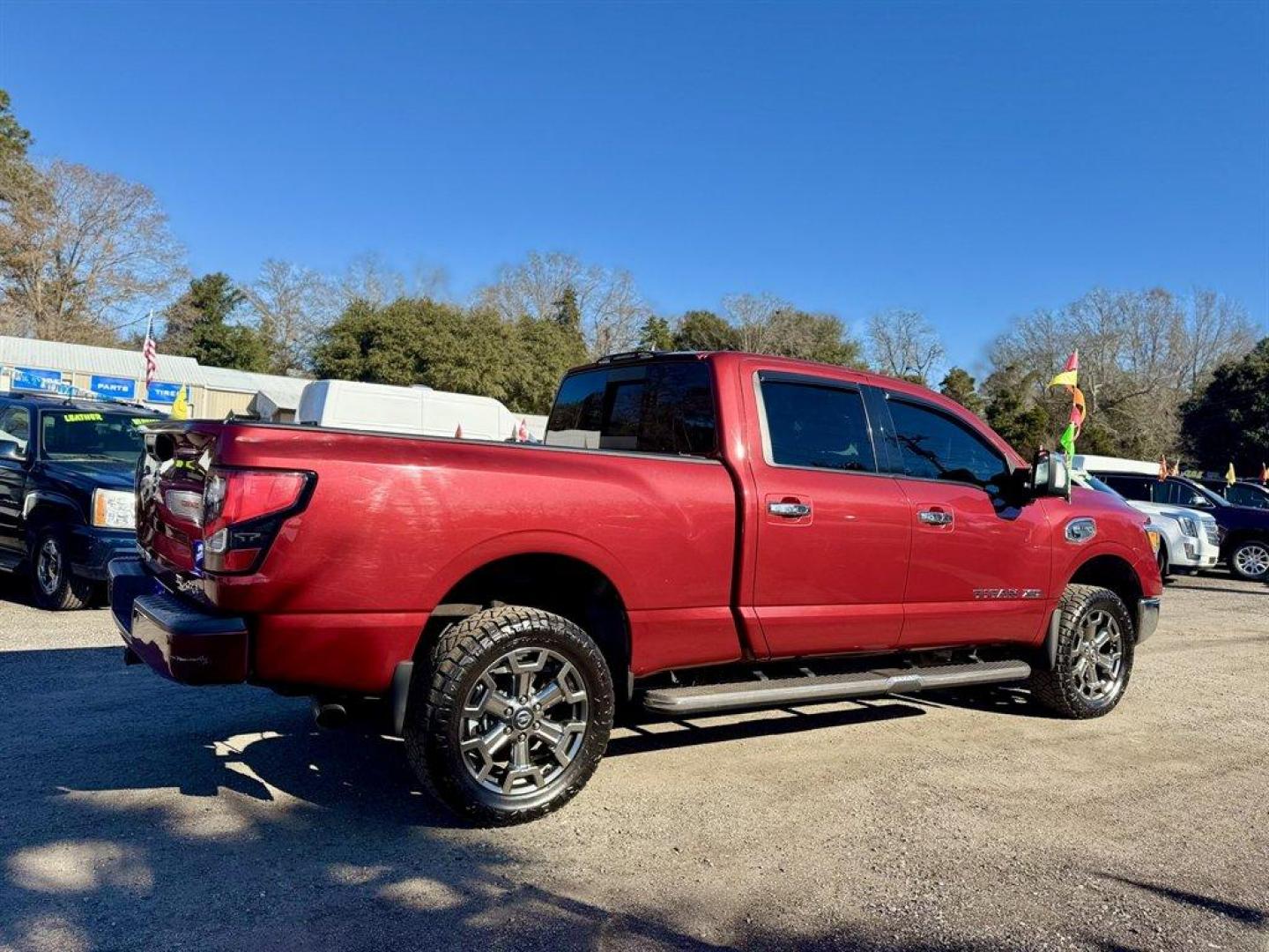 2017 Red /Beige Nissan Titan XD (1N6BA1F40HN) with an 5.0l V8 DI Dohc Tdsl 5.0l engine, Automatic transmission, located at 745 East Steele Rd., West Columbia, SC, 29170, (803) 755-9148, 33.927212, -81.148483 - Photo#3