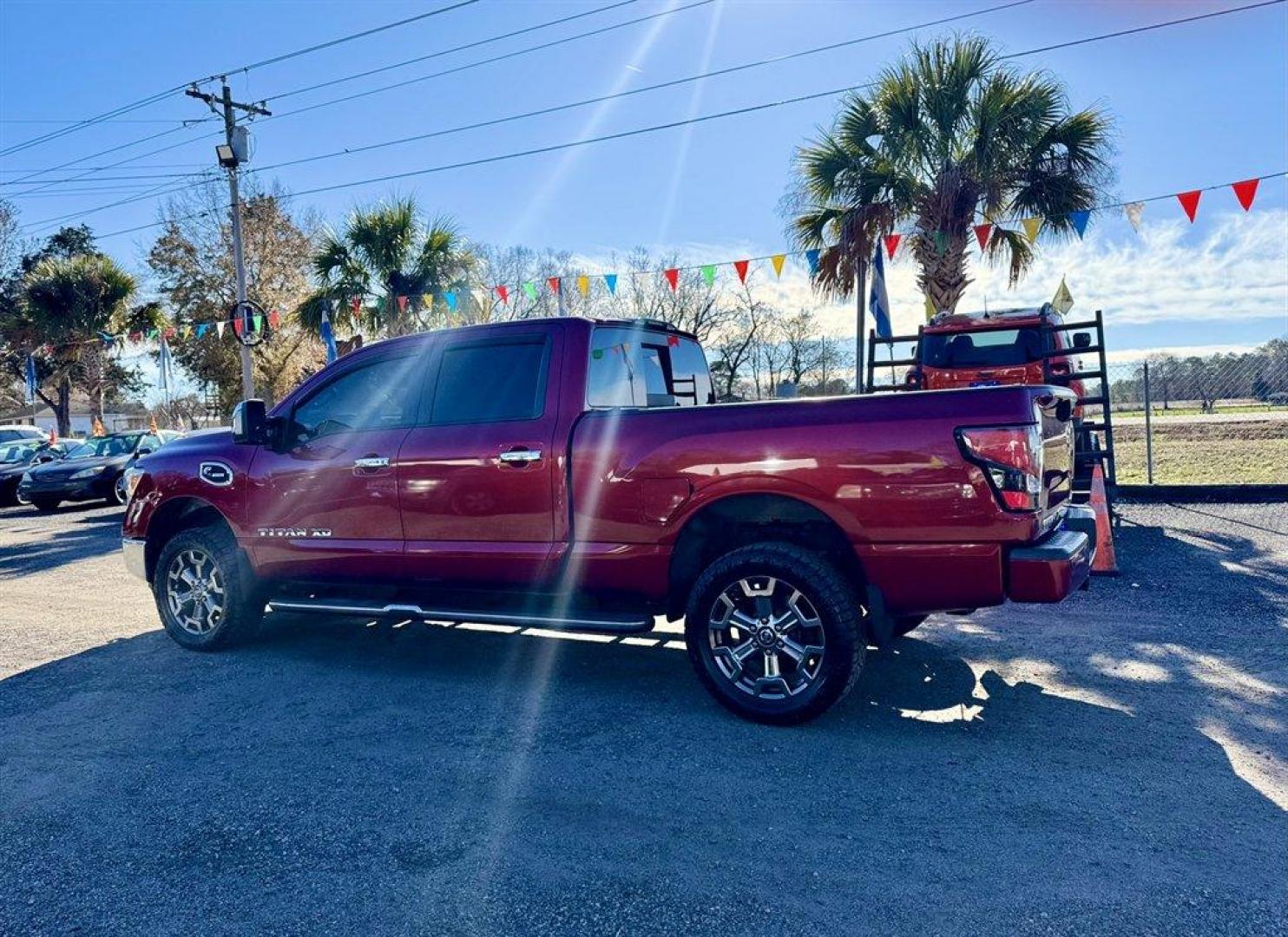 2017 Red /Beige Nissan Titan XD (1N6BA1F40HN) with an 5.0l V8 DI Dohc Tdsl 5.0l engine, Automatic transmission, located at 745 East Steele Rd., West Columbia, SC, 29170, (803) 755-9148, 33.927212, -81.148483 - Photo#5