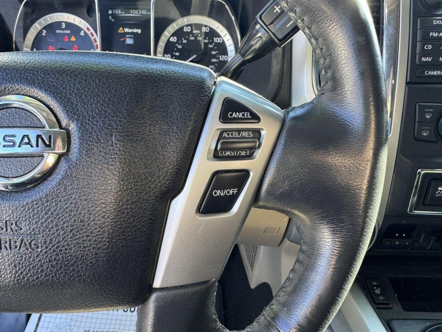 2017 Red /Beige Nissan Titan XD (1N6BA1F40HN) with an 5.0l V8 DI Dohc Tdsl 5.0l engine, Automatic transmission, located at 745 East Steele Rd., West Columbia, SC, 29170, (803) 755-9148, 33.927212, -81.148483 - Photo#9