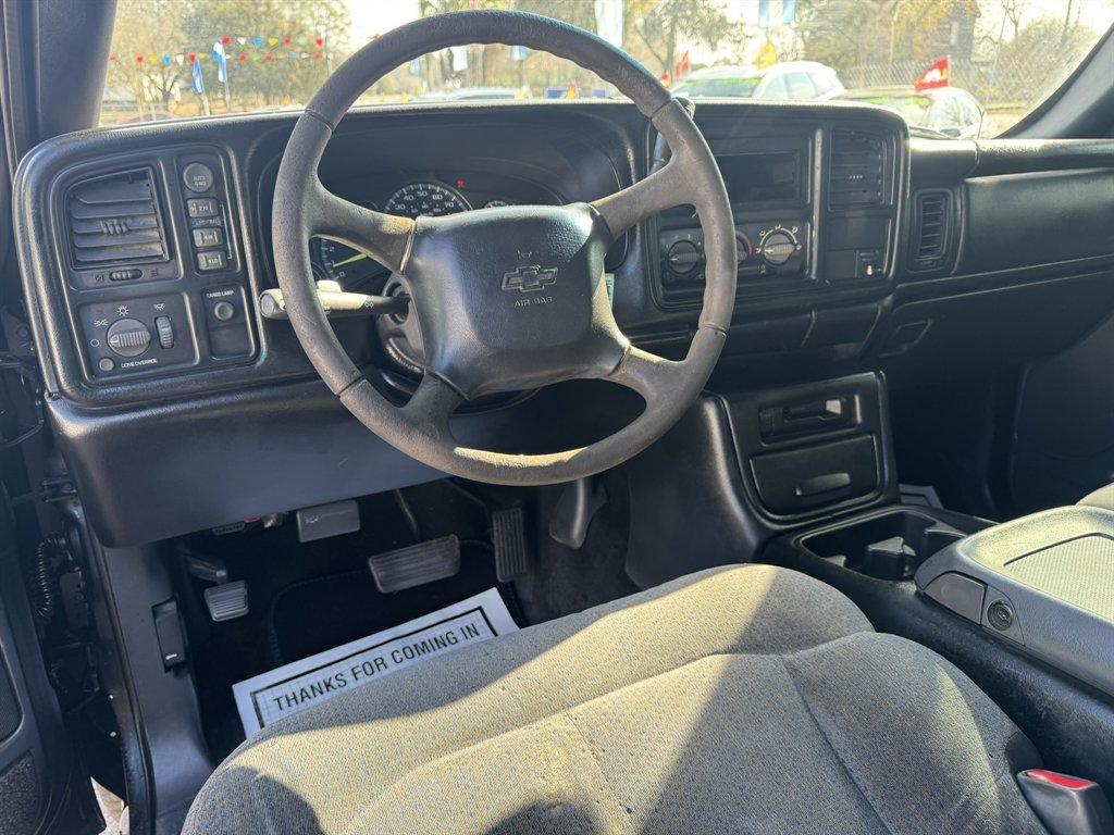 2001 Black /Grey Chevrolet Silverado 1500 (1GCEK19T21E) with an 5.3l V8 SFI 5.3l engine, Automatic transmission, located at 745 East Steele Rd., West Columbia, SC, 29170, (803) 755-9148, 33.927212, -81.148483 - Photo#5