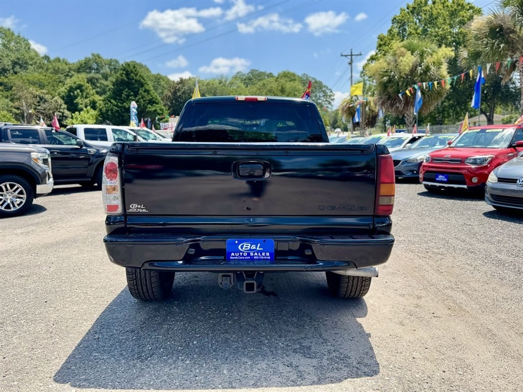 2001 Black /Grey Chevrolet Silverado 1500 (1GCEK19T21E) with an 5.3l V8 SFI 5.3l engine, Automatic transmission, located at 745 East Steele Rd., West Columbia, SC, 29170, (803) 755-9148, 33.927212, -81.148483- Photo#4